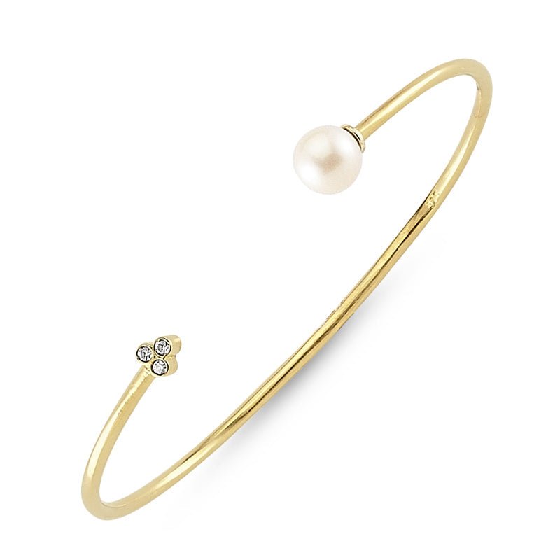 Lyra Silver Pearl Bracelet Cuff featuring 925 sterling silver, freshwater pearl, and clear CZ crystals in a stylish design.