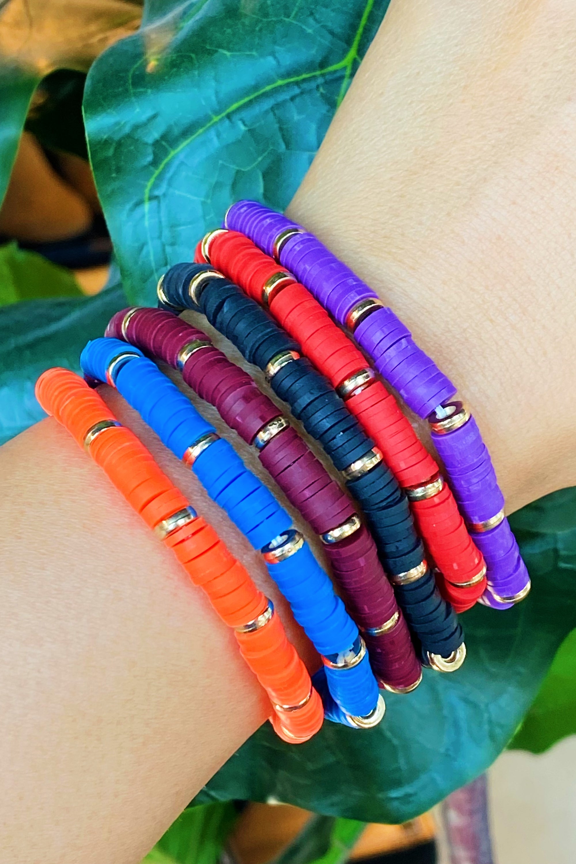 Madison Stretchy Bracelet featuring colorful discs and gold beads, perfect for layering and Game Day.