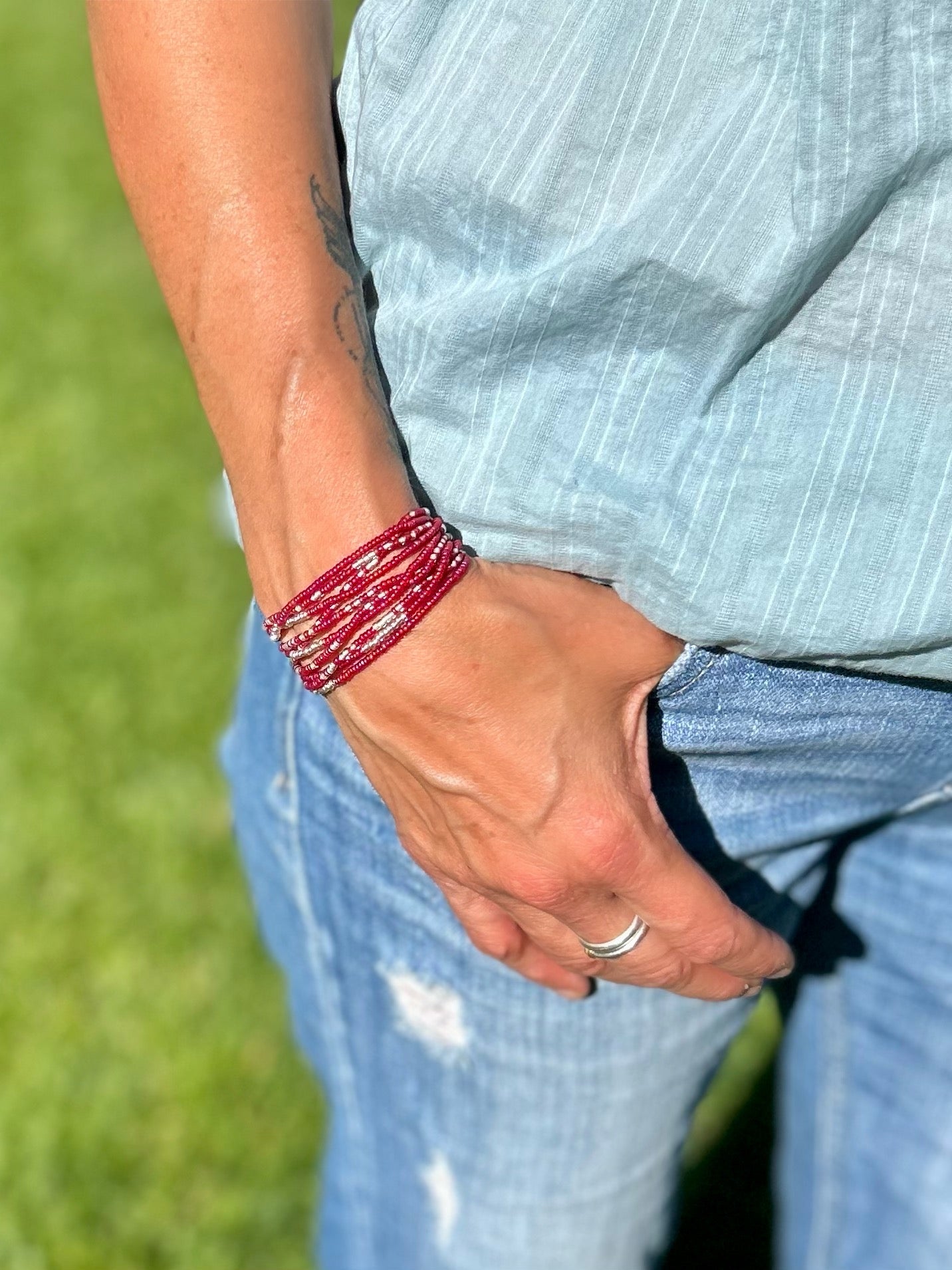 Magenta Silver-Sprinkle Beaded 5-Wrap Bracelet featuring Czech glass seed beads and metallic silver accents, elegantly wrapped around a wrist.