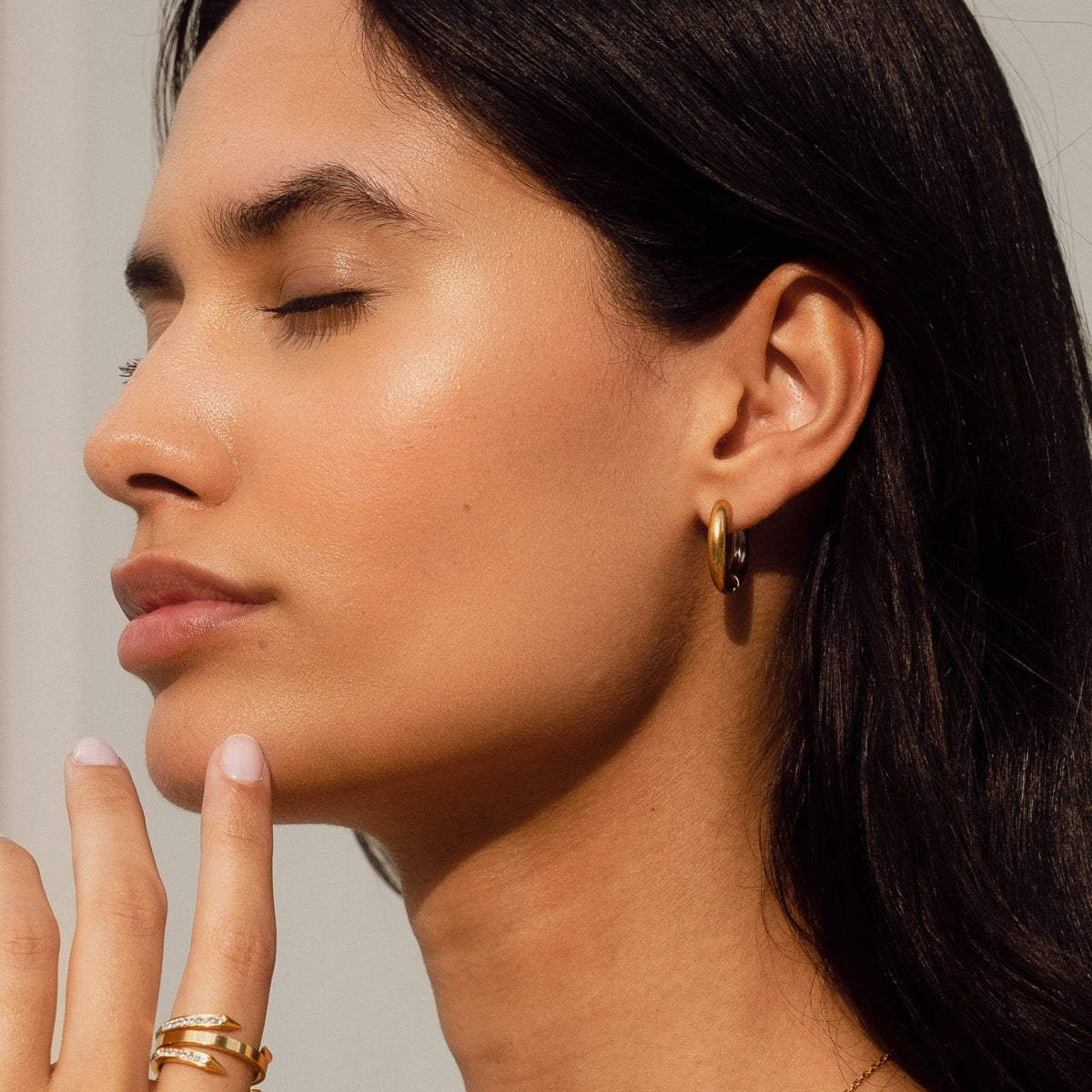 Maha Contrast Hoop Earrings featuring gold and silver tones, elegantly designed with a modern twist.