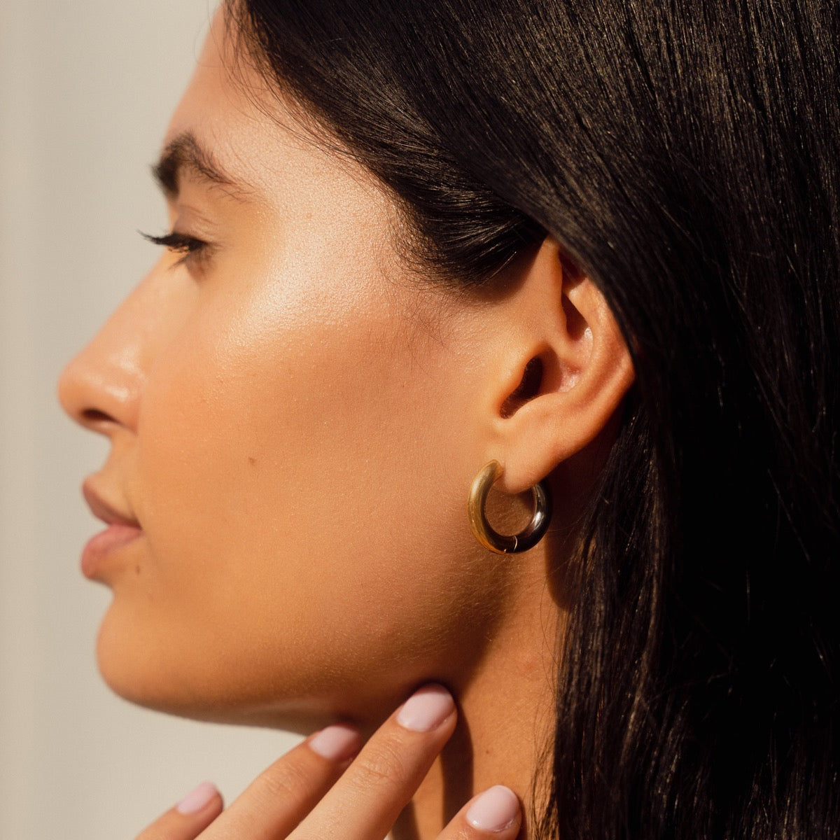 Maha Contrast Hoop Earrings featuring gold and silver tones, elegantly designed with a modern twist.