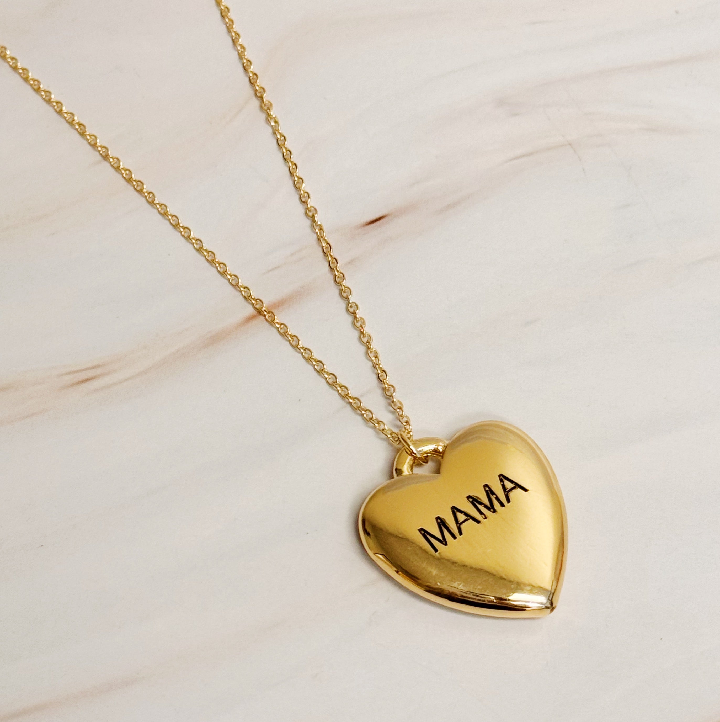 Mama Engraved Heart Pendant Necklace featuring a heavy heart lock pendant with 'mama' engraving on a stylish chain.