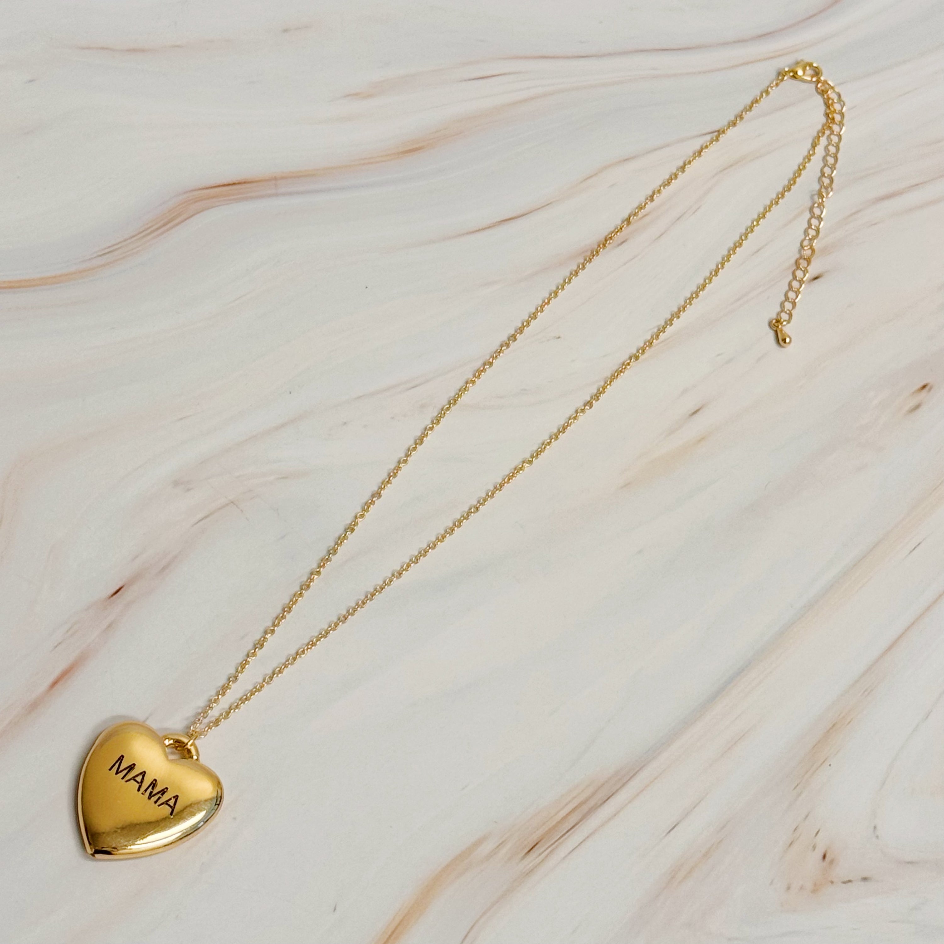 Mama Engraved Heart Pendant Necklace featuring a heavy heart lock pendant with 'mama' engraving on a stylish chain.