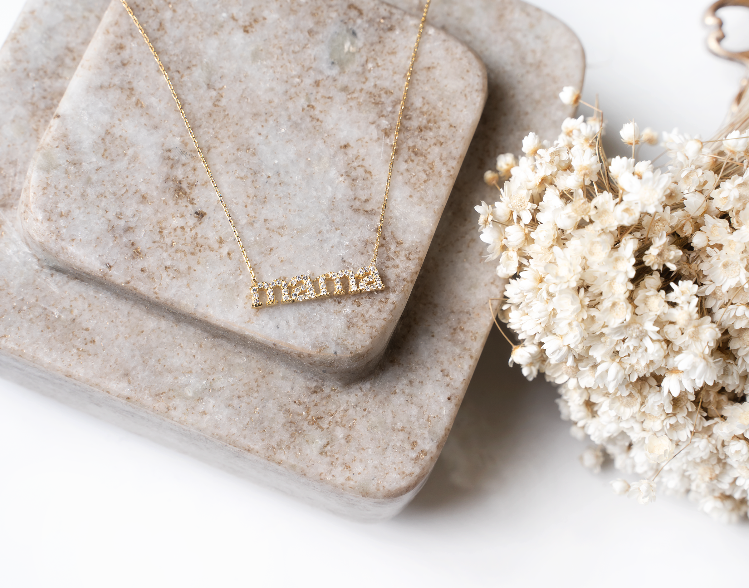 MAMA Necklace III featuring a nameplate design in polished 925 sterling silver with yellow gold plating and sparkling cubic zirconia stones.