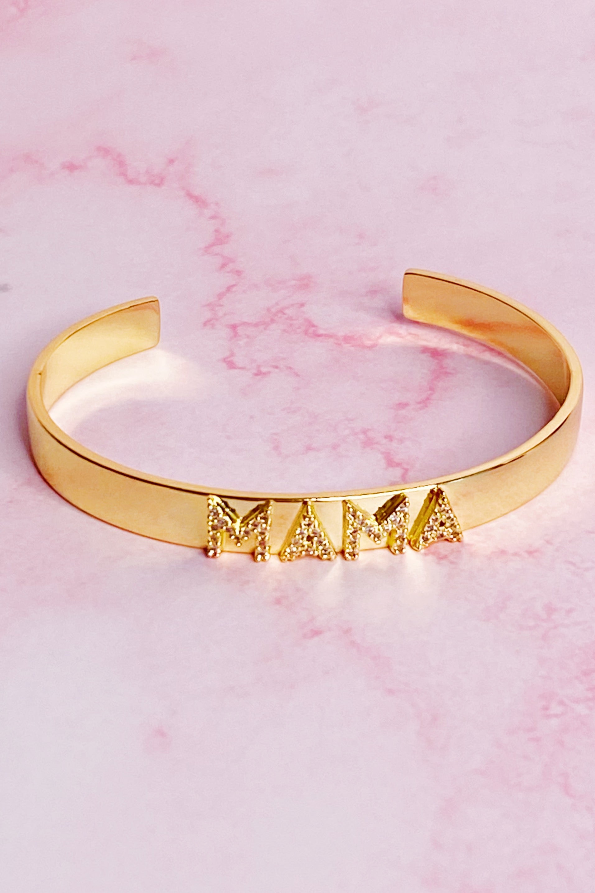 Mama Open Bangle Bracelet featuring shiny cubic zirconia stones on an elegant gold plated design.