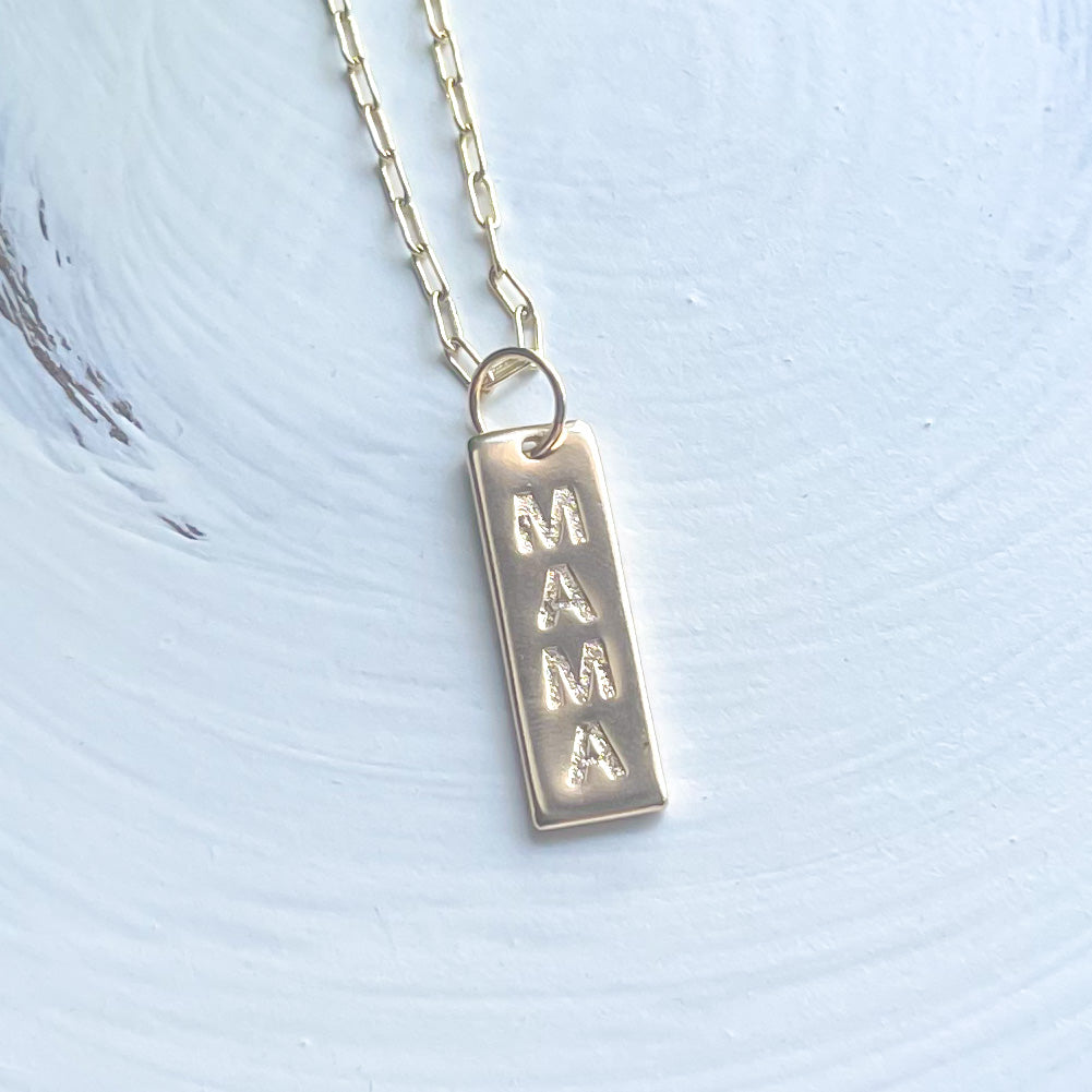 Mama Pendant Necklace featuring an elegant design with the word 'Mama' on a gold-filled chain, perfect for gifting to mothers.