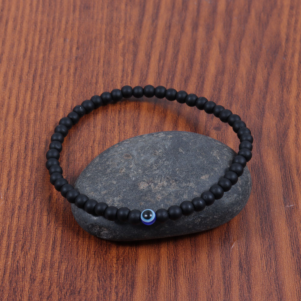 MANERE Steel Bracelet I 9310723 featuring an elegant design with an evil eye symbol, crafted from high-quality steel.