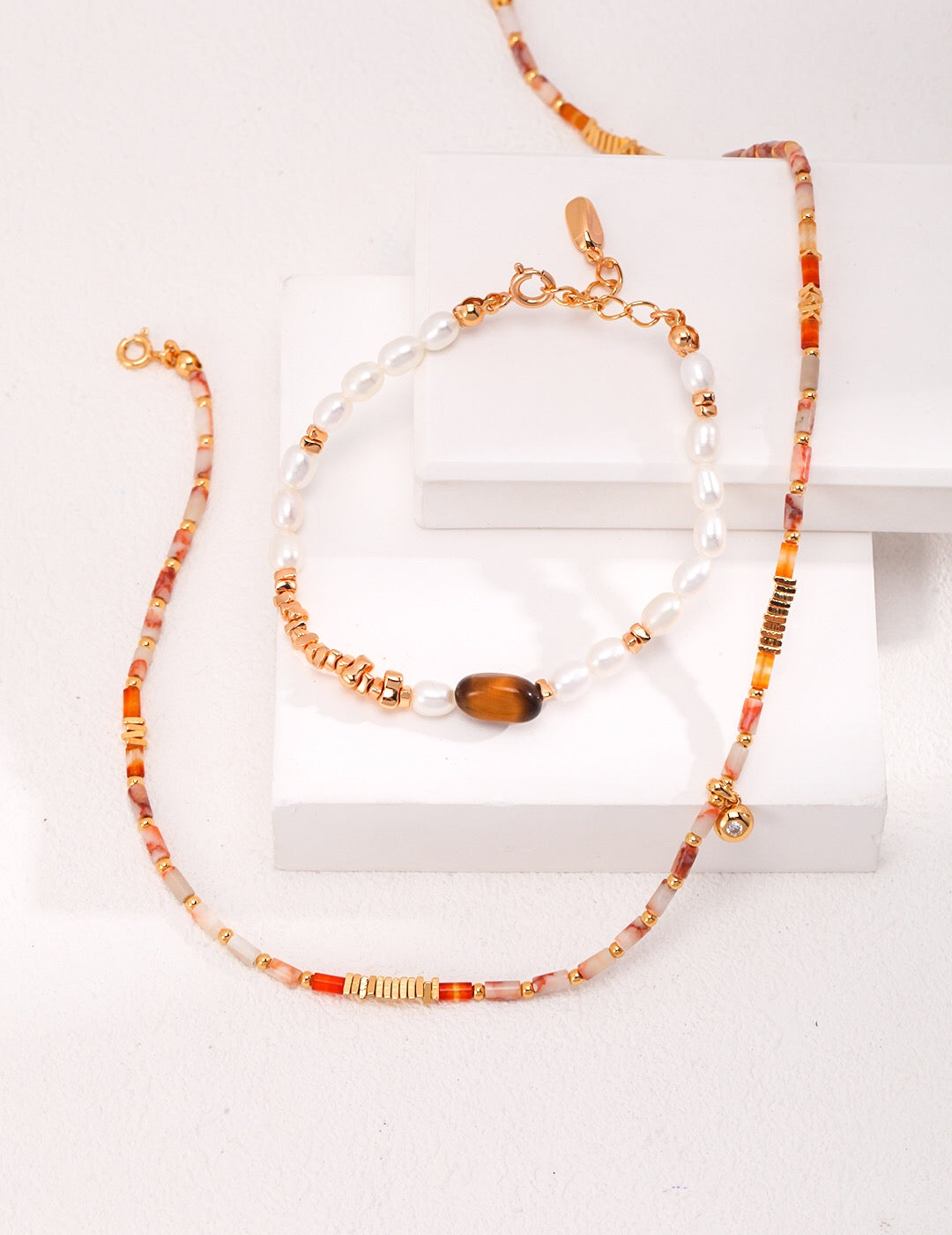 Handmade Maple and Ginkgo Leaf Silver Necklace featuring red mesh, red agate, and zircon, elegantly plated with 18ct gold vermeil.