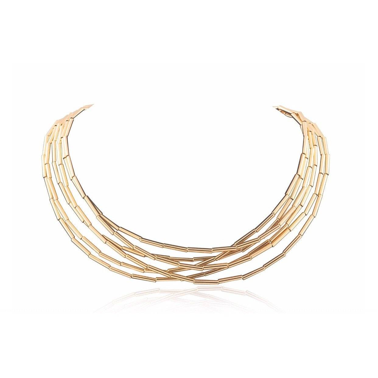 Mara Wrap Necklace featuring an 18k Brazilian gold filled 78-inch chain, styled elegantly around a mannequin's neck.