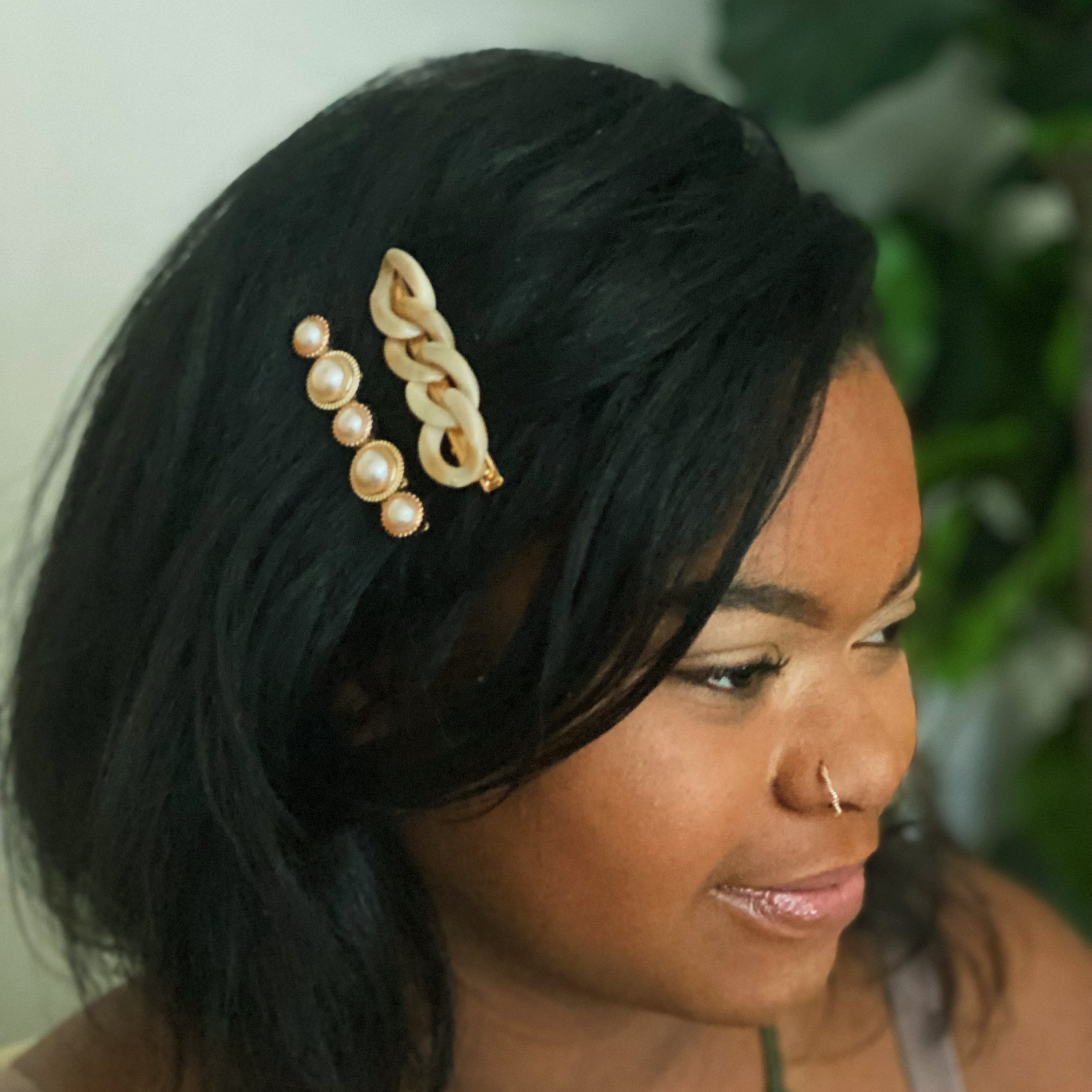 A stylish Marble Chain and Pearl Hair Clip Set featuring two elegant clips with neutral marble chains and pearl accents.