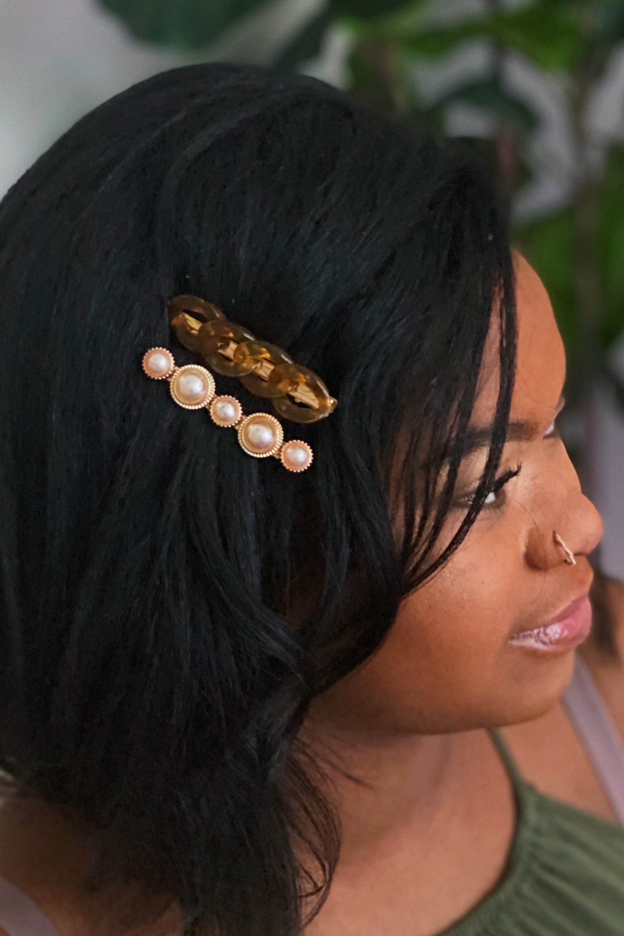 A stylish Marble Chain and Pearl Hair Clip Set featuring two elegant clips with neutral marble chains and pearl accents.