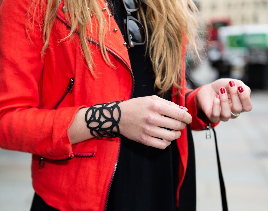 Marble Recycled Rubber Bracelet showcasing unique patterns and textures, handcrafted from reclaimed tire inner tubes.