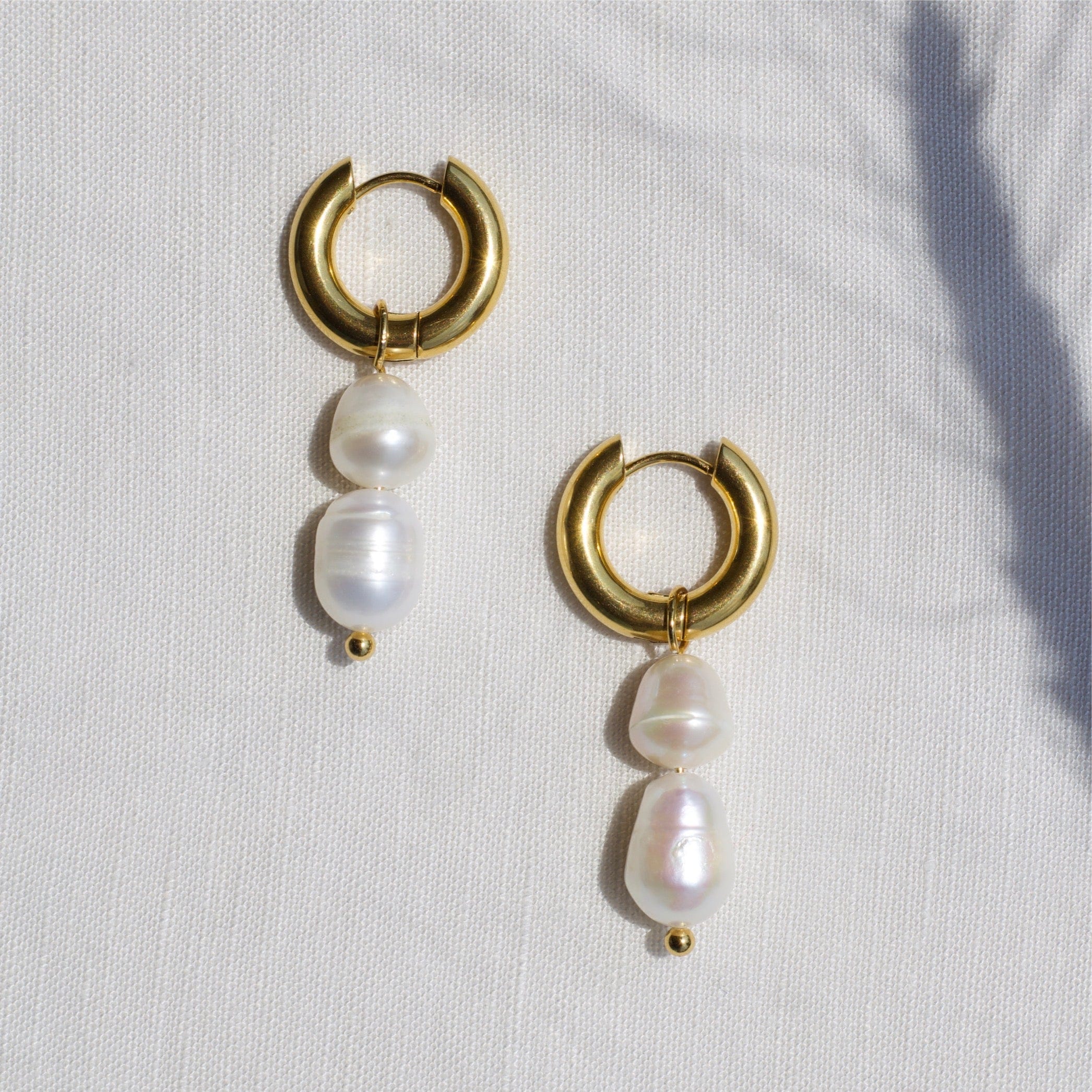 Marc Pearl Earrings Vintage featuring irregular freshwater pearls on 18K gold PVD chunky hoops, elegant and versatile design.