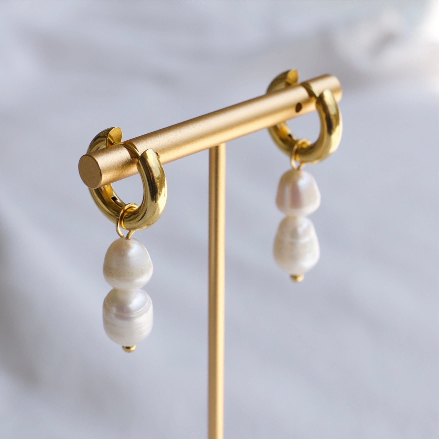 Marc Pearl Earrings Vintage featuring irregular freshwater pearls on 18K gold PVD chunky hoops, elegant and versatile design.