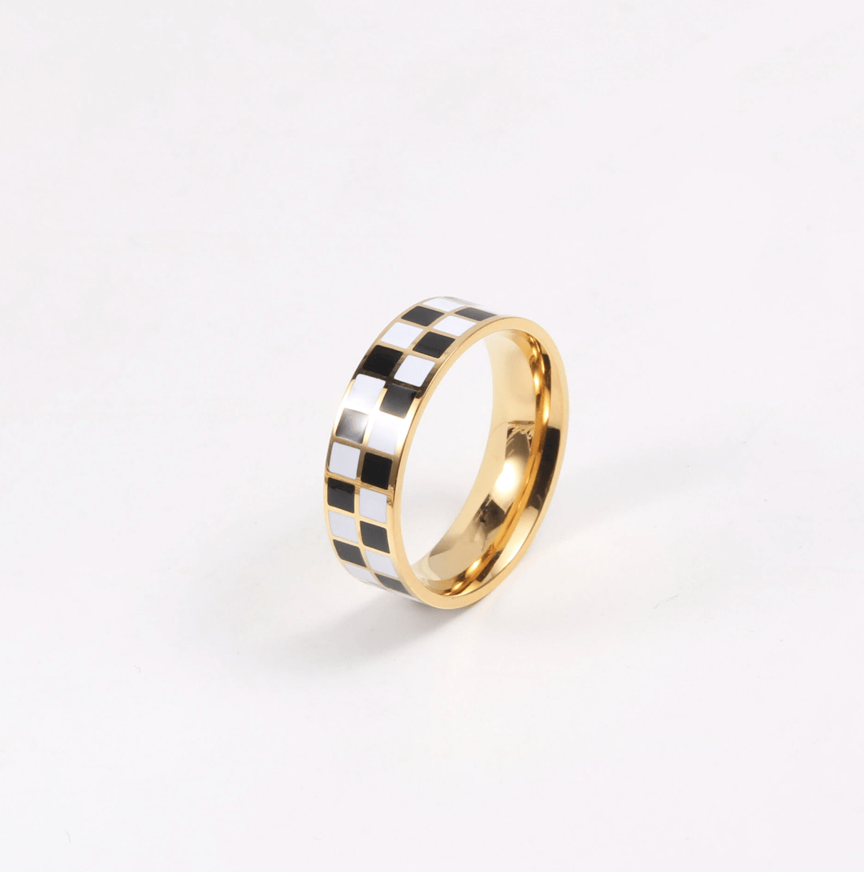 Margaux Black and White Karo Block Band featuring a classic check-board design in stainless steel with 18Kt yellow gold coating.