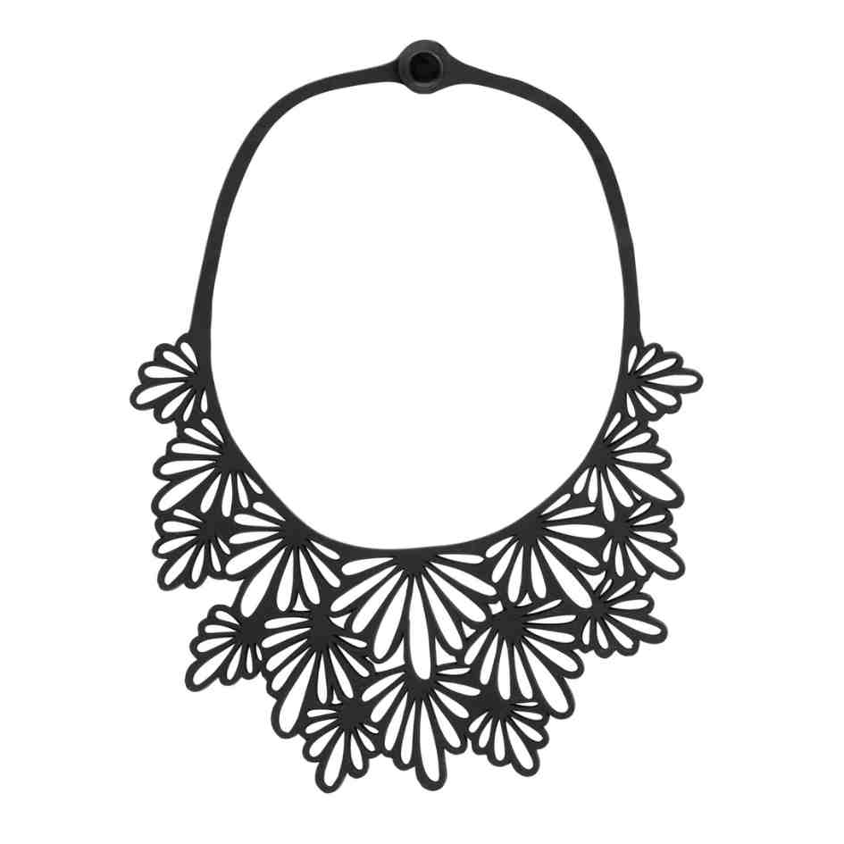 A vibrant Marigold Statement Recycled Rubber Necklace handcrafted from reclaimed tyre inner tubes, showcasing unique textures and patterns.