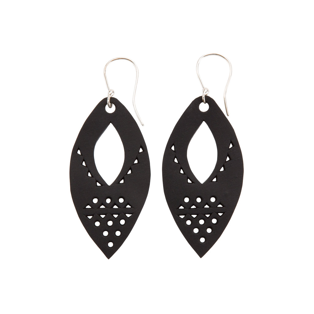 A pair of Marquise Intricate Recycled Rubber Earrings, showcasing unique designs crafted from reclaimed inner tubes with sterling silver hooks.