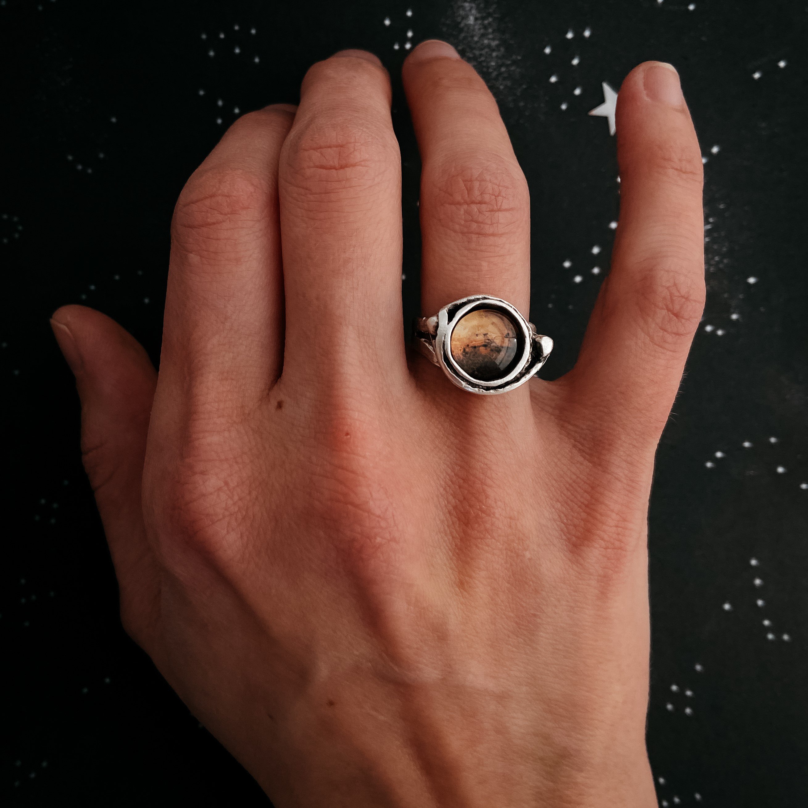 Mars and Moons Ring featuring a red Mars planet with two orbiting silver beads representing Deimos and Phobos, handcrafted in silver plated brass.