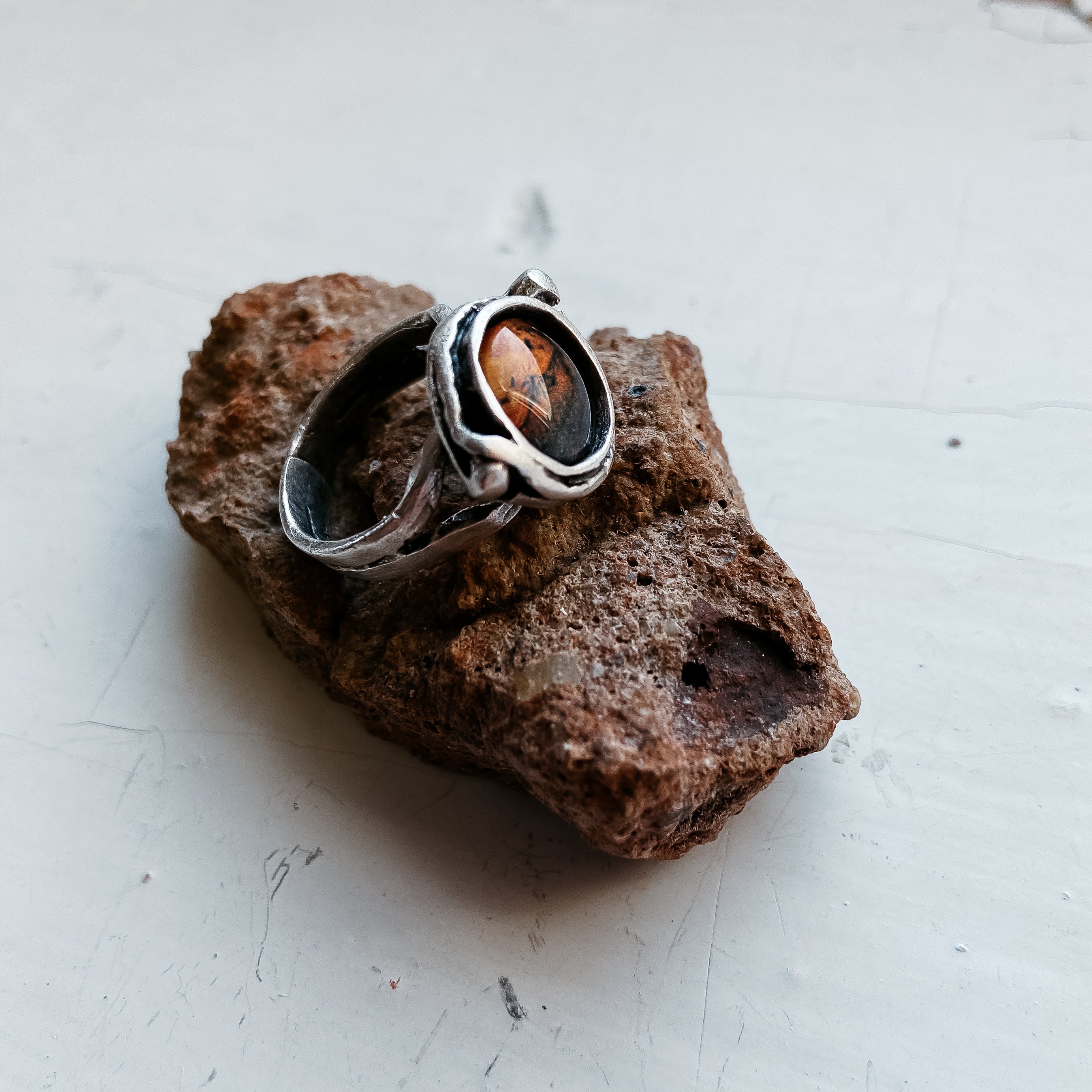 Mars and Moons Ring featuring a red Mars planet with two orbiting silver beads representing Deimos and Phobos, handcrafted in silver plated brass.