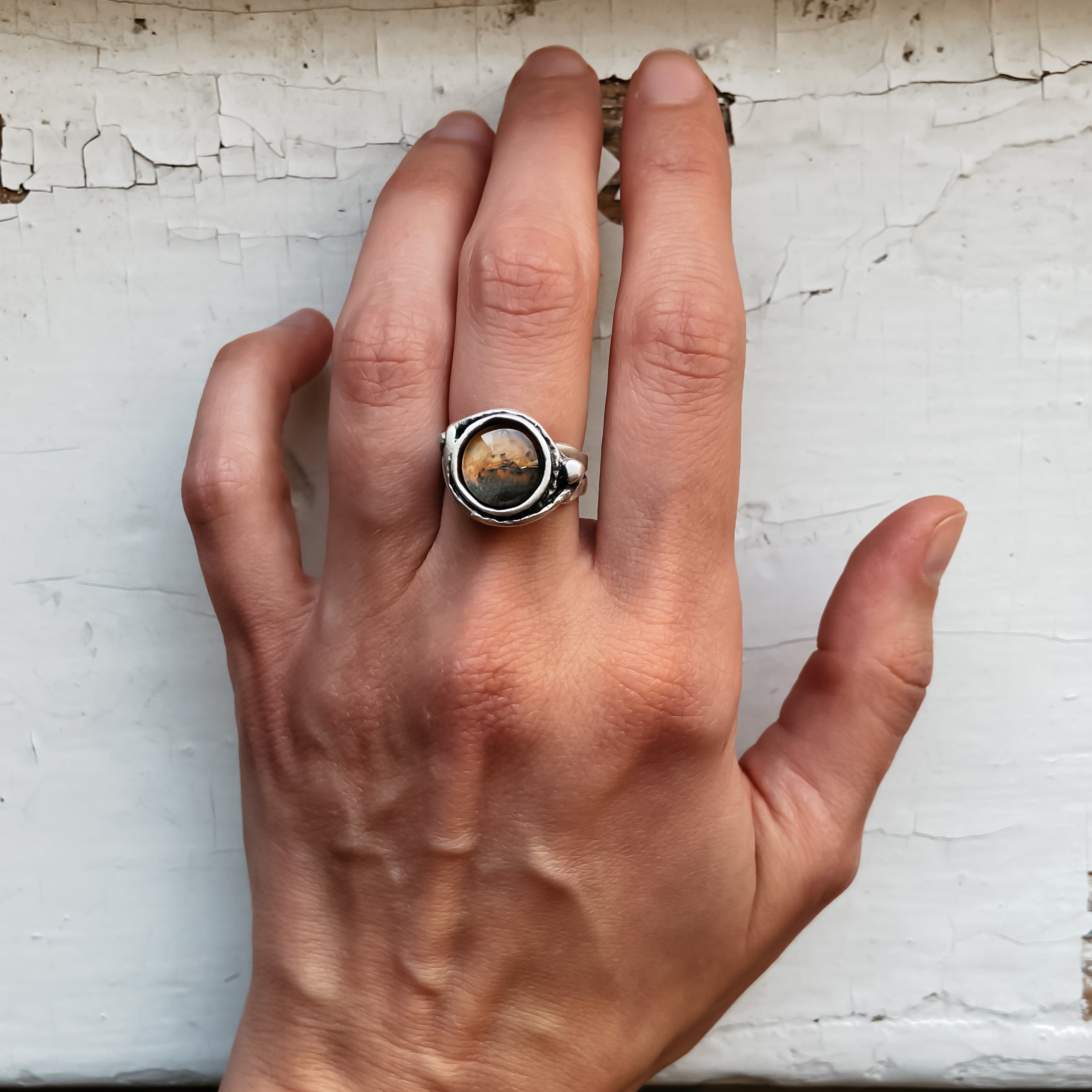 Mars and Moons Ring featuring a red Mars planet with two orbiting silver beads representing Deimos and Phobos, handcrafted in silver plated brass.