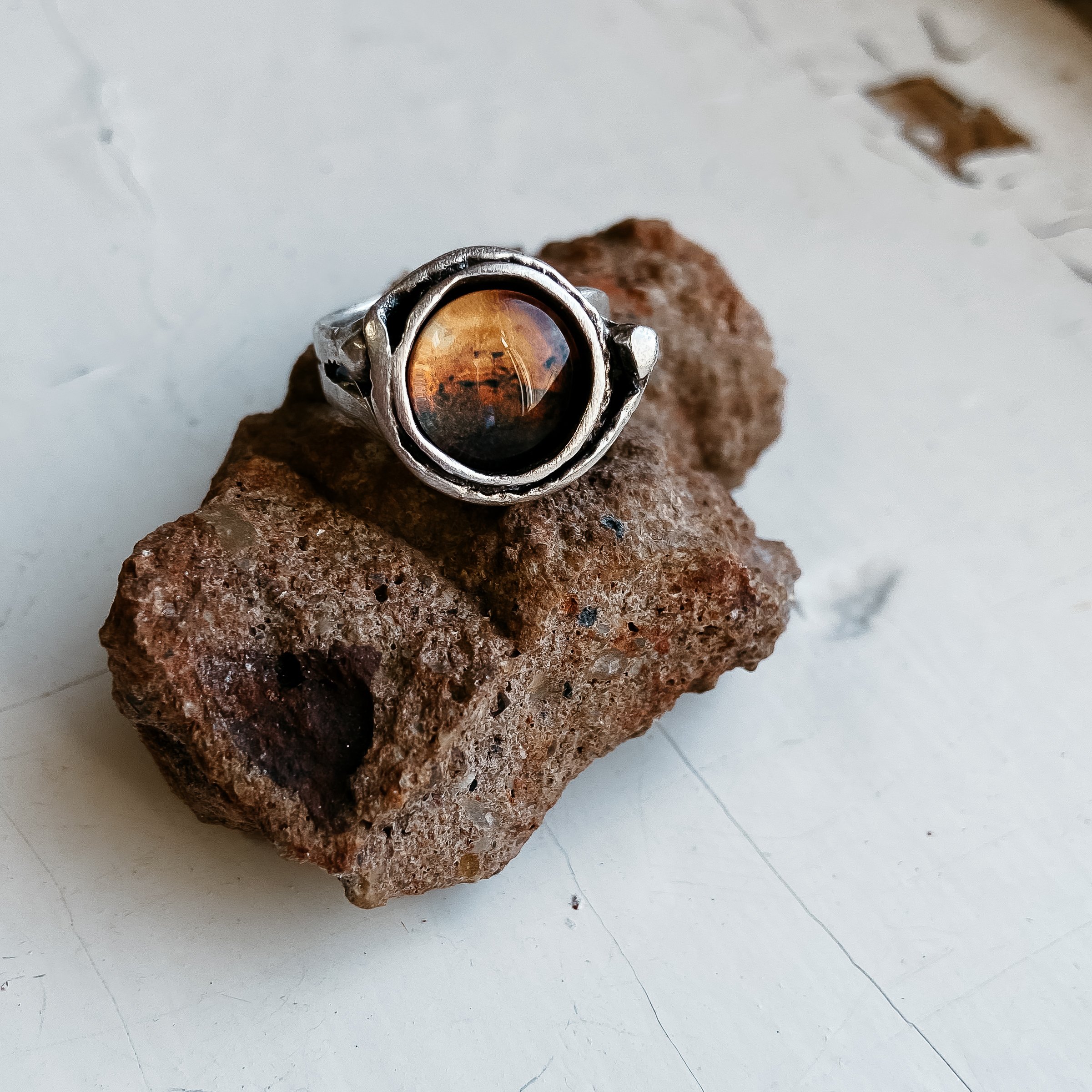 Mars and Moons Ring featuring a red Mars planet with two orbiting silver beads representing Deimos and Phobos, handcrafted in silver plated brass.