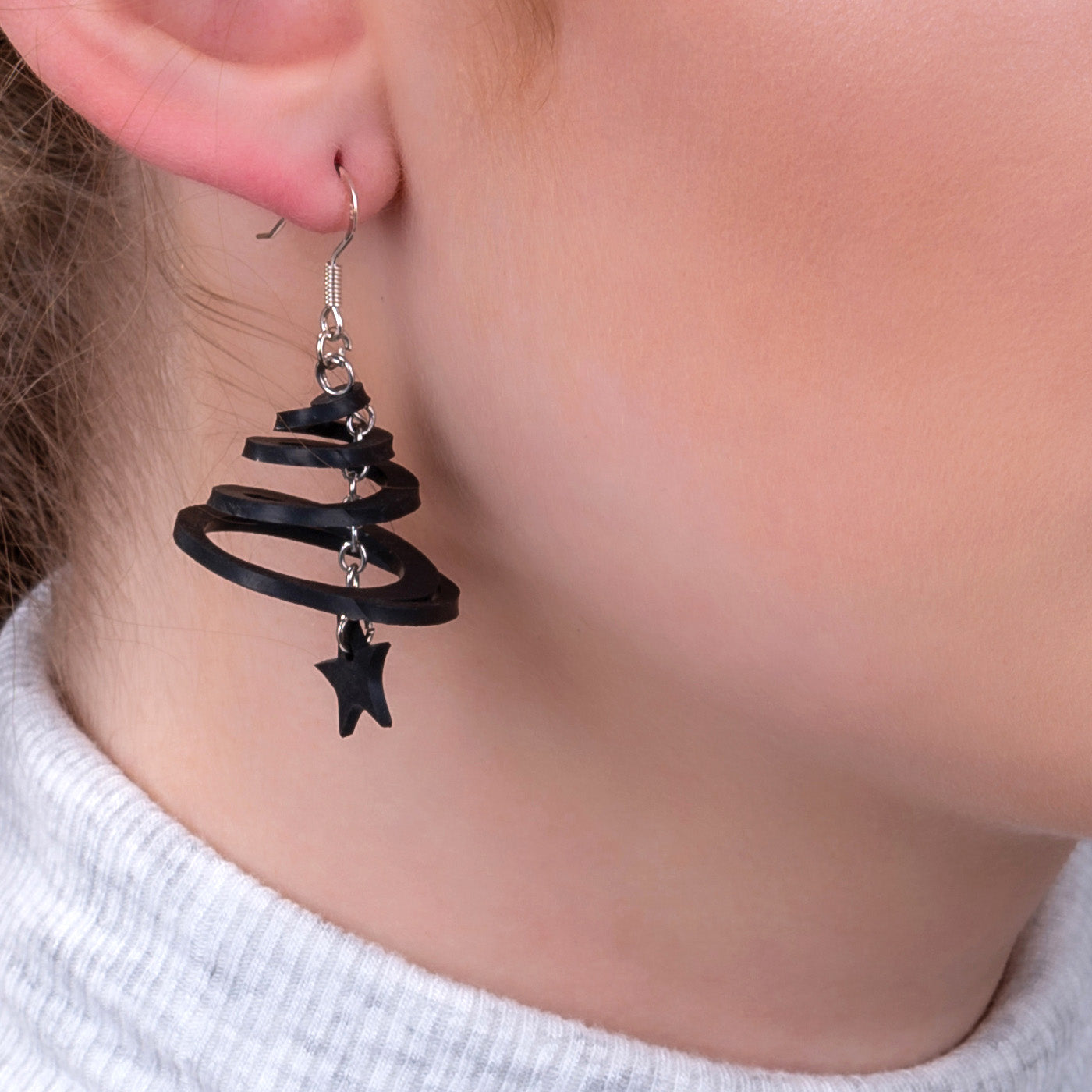 Handcrafted Mars & Venus Unique Recycle Rubber Earrings featuring a star and circle design, made from reclaimed rubber.