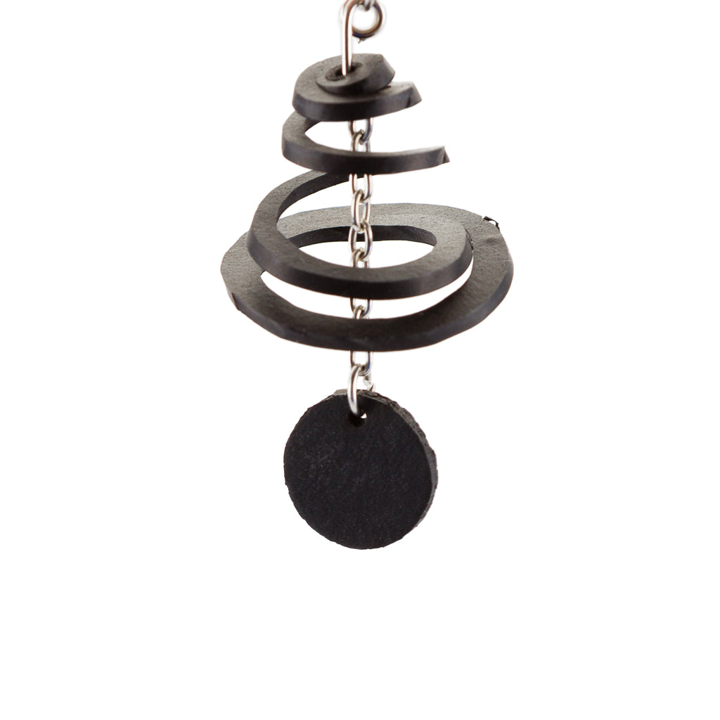 Handcrafted Mars & Venus Unique Recycle Rubber Earrings featuring a star and circle design, made from reclaimed rubber.