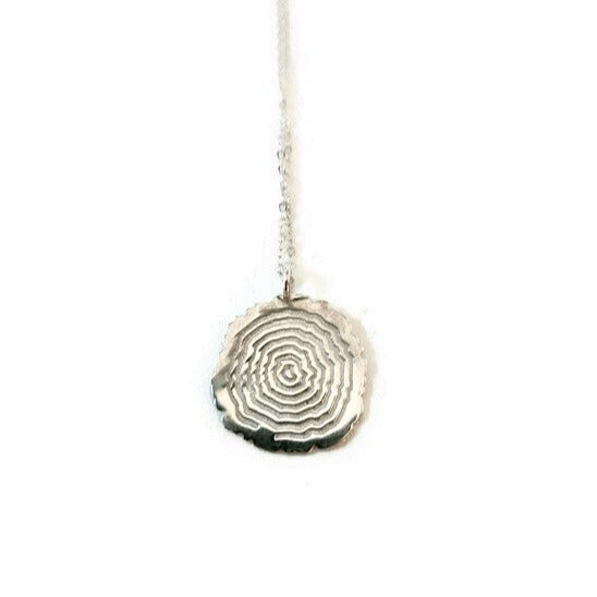 Matsuyo Tree Ring Necklace featuring a sterling silver pendant with detailed log rings, available in various chain lengths and plating options.