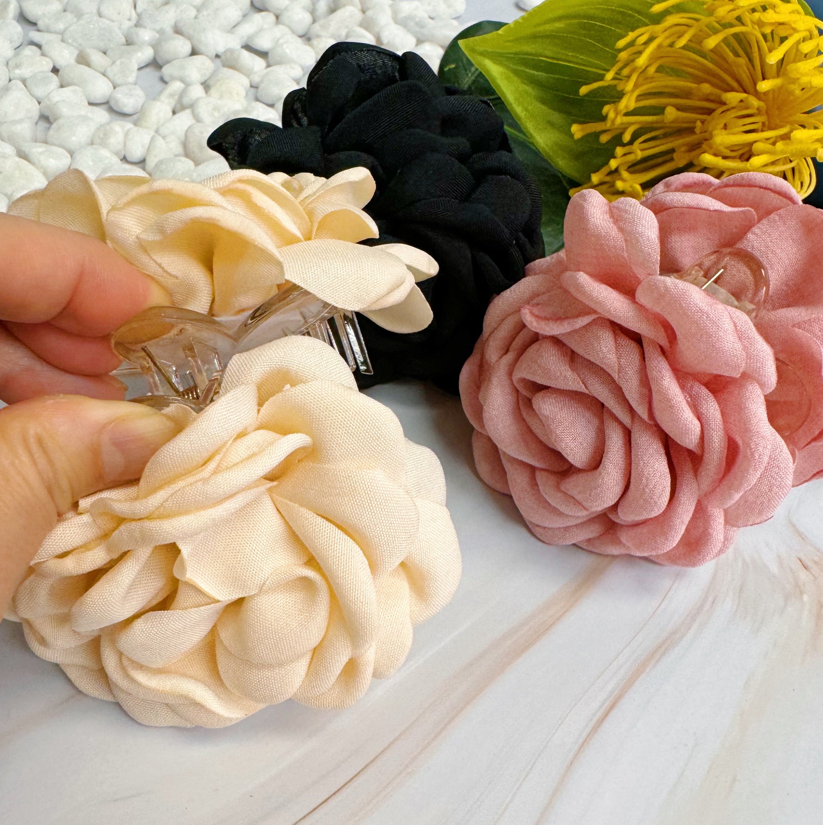 May Rose Double Sided Hair Claw featuring delicate fabric petals and floral design, perfect for elegant hairstyles.