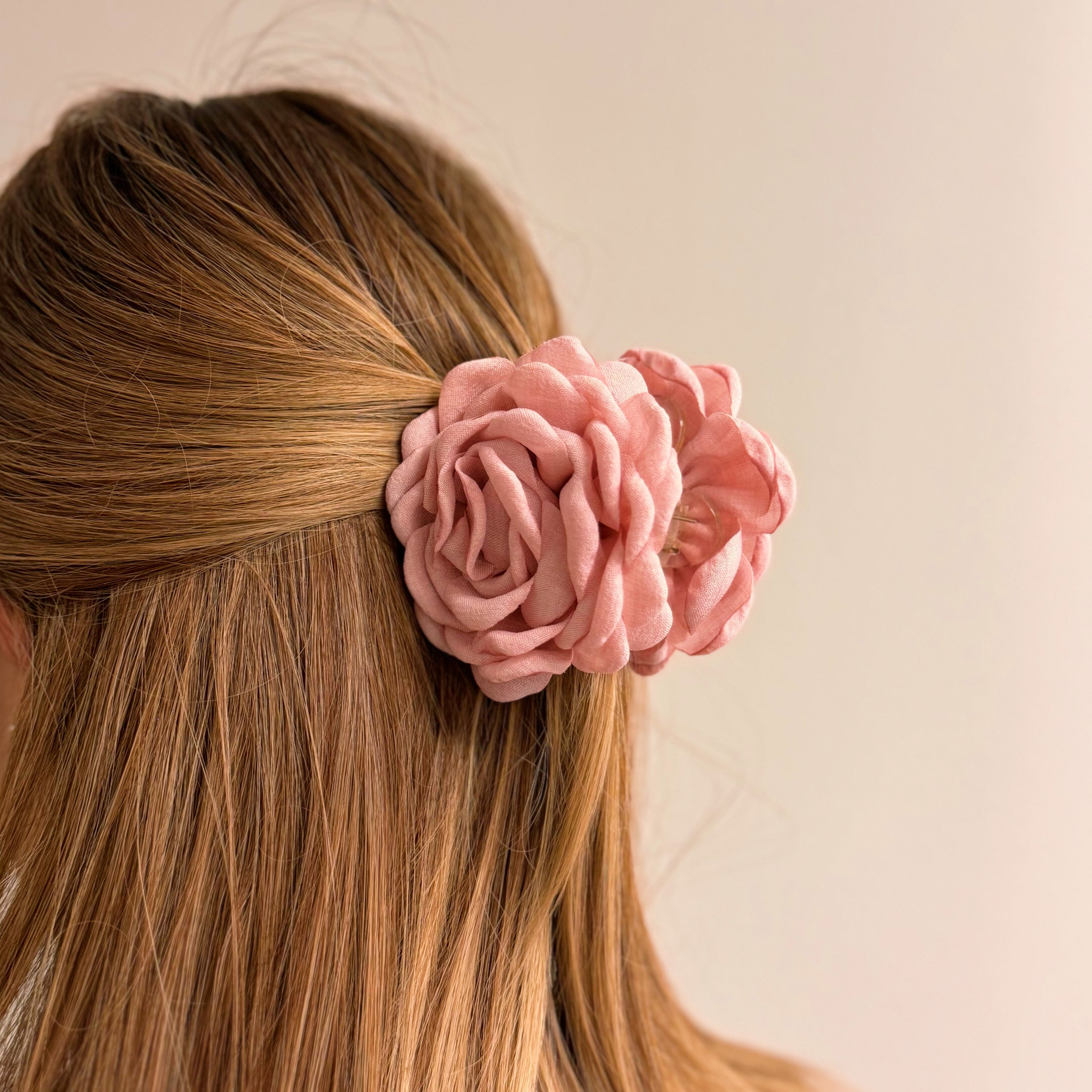 May Rose Double Sided Hair Claw featuring delicate fabric petals and floral design, perfect for elegant hairstyles.