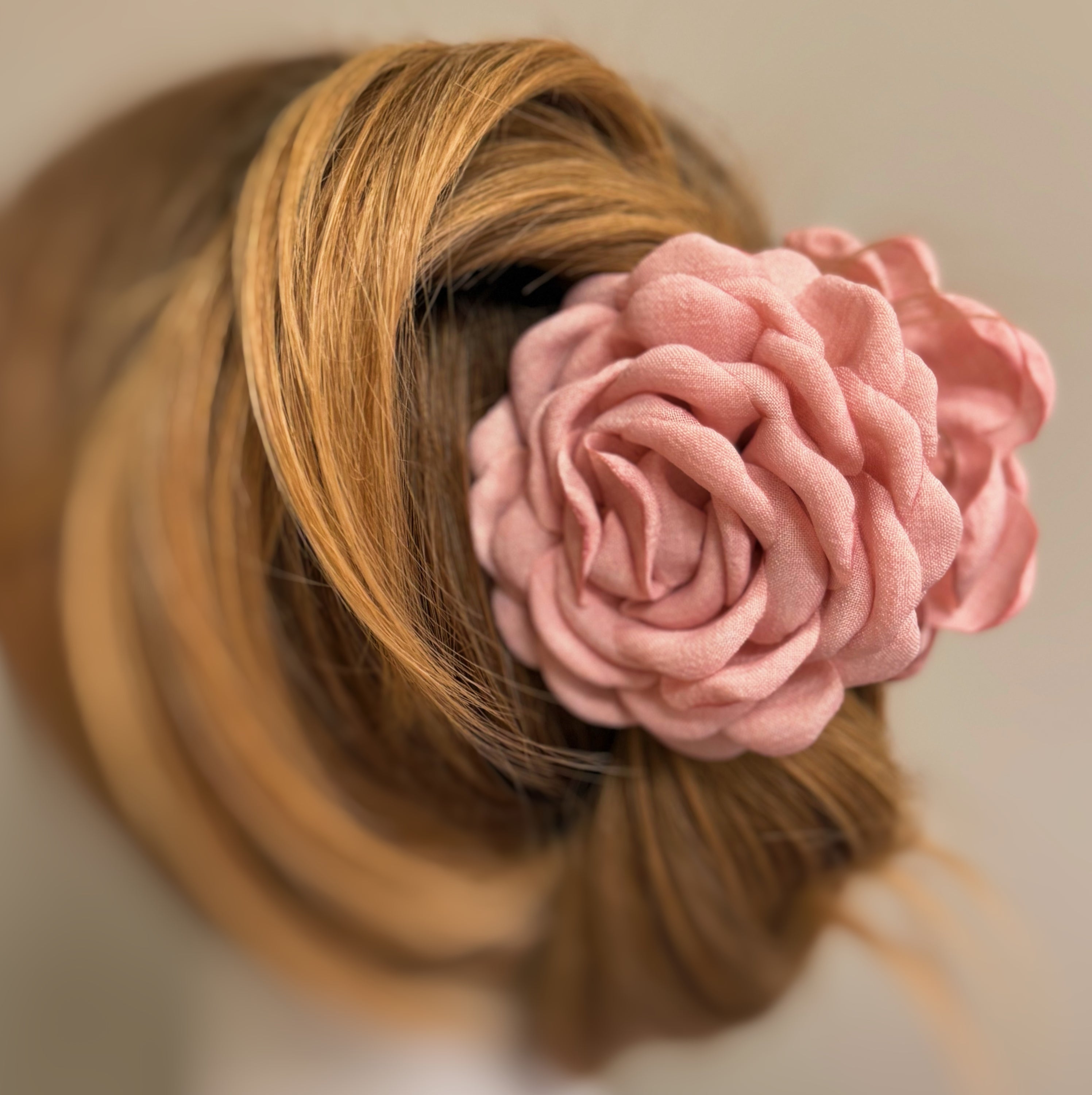 May Rose Double Sided Hair Claw featuring delicate fabric petals and floral design, perfect for elegant hairstyles.