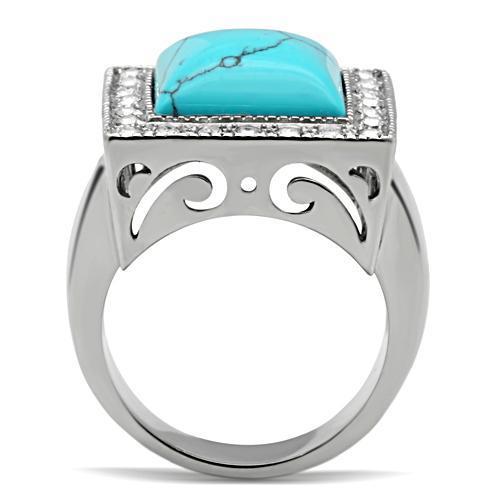 Men's stainless steel ring featuring synthetic turquoise in vibrant sea blue color, high polished finish.