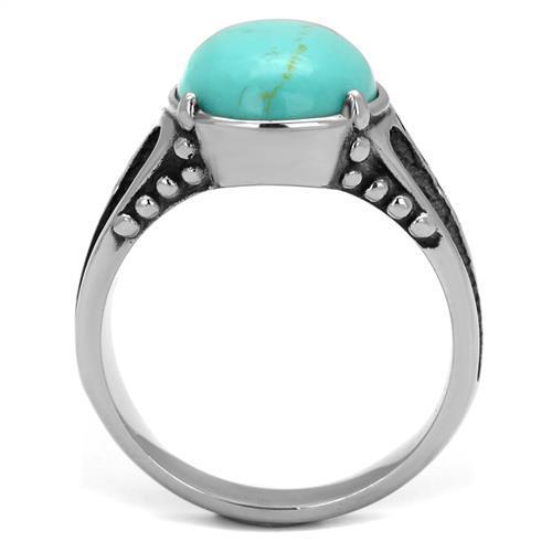 Men's stainless steel ring featuring a vibrant synthetic turquoise stone, high-polished finish, and sleek design.