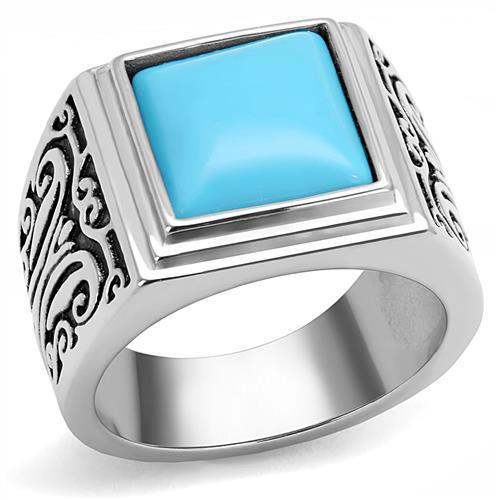 Men's stainless steel ring featuring synthetic turquoise in a vibrant sea blue color, showcasing a polished finish.