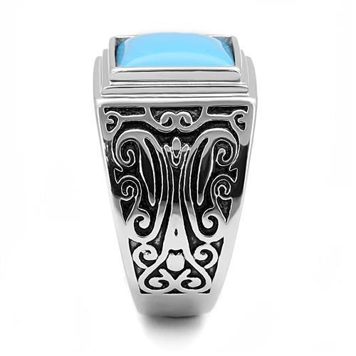 Men's stainless steel ring featuring synthetic turquoise in a vibrant sea blue color, showcasing a polished finish.