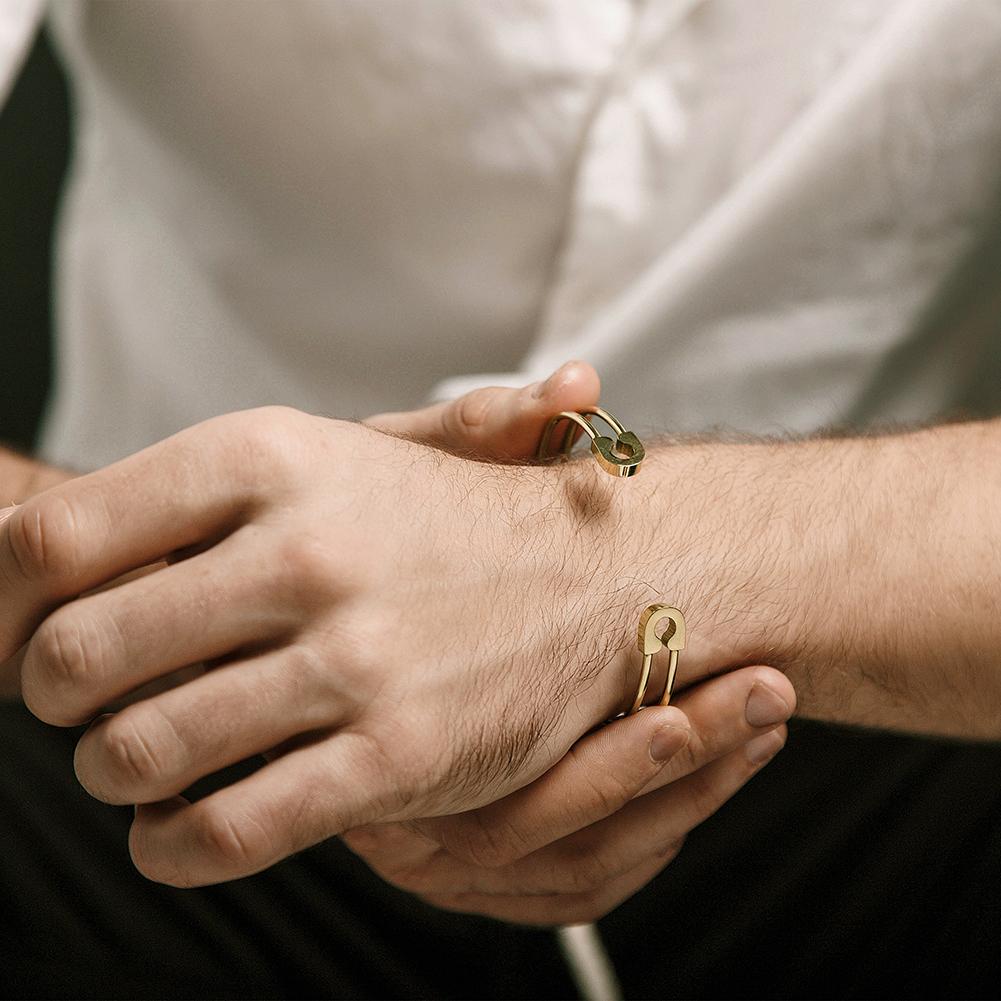 Men's Hollow Cuff Bracelet made of 316L surgical stainless steel with 14K gold PVD plating, showcasing a sleek and modern design.