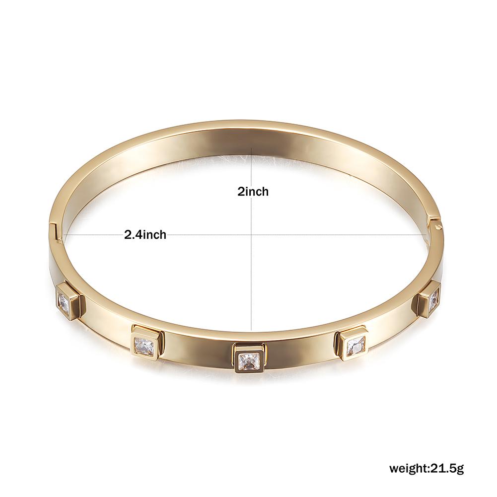 A stylish Metal Stone Hinged Bangle made of 316L surgical stainless steel with 14K gold PVD plating, showcasing its elegant design.