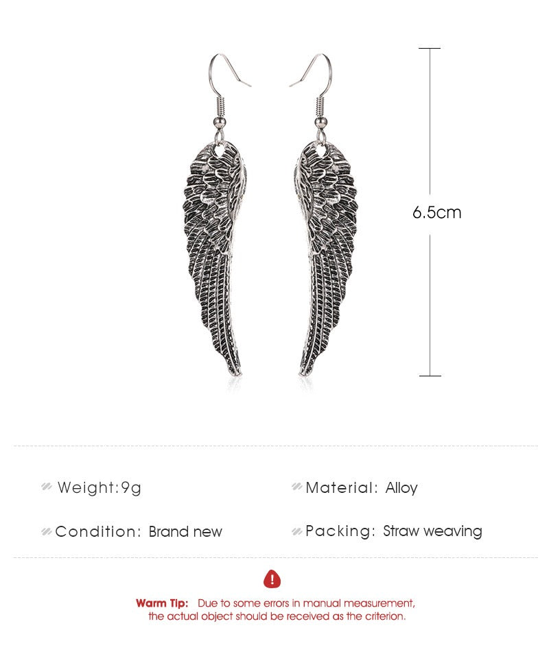 A pair of stylish metallic angel's wings earrings made from alloy, showcasing intricate detailing and a polished finish.