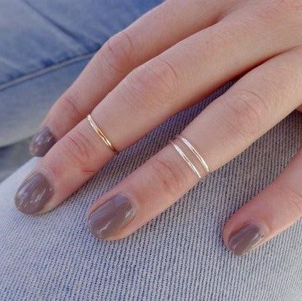 Mia 1 mm Skinny Stacking Ring in sterling silver and gold fill, showcasing its elegant and minimalist design.