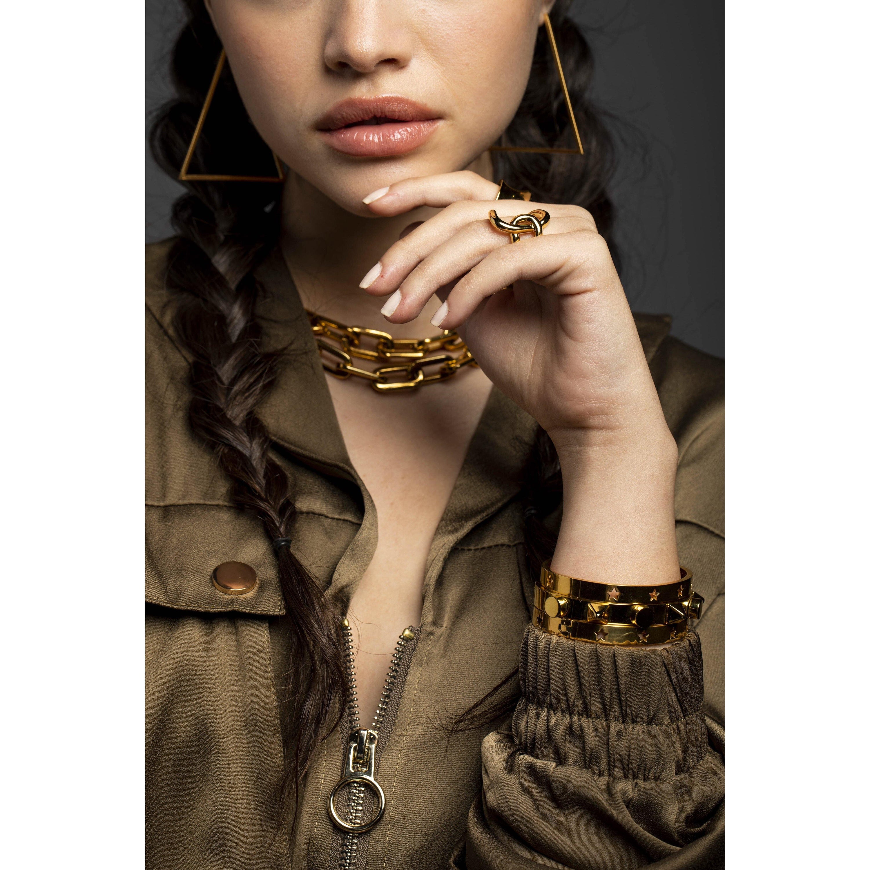 Mia Star Bracelet featuring perforated stars, 18k gold plated over stainless steel, perfect for layering.