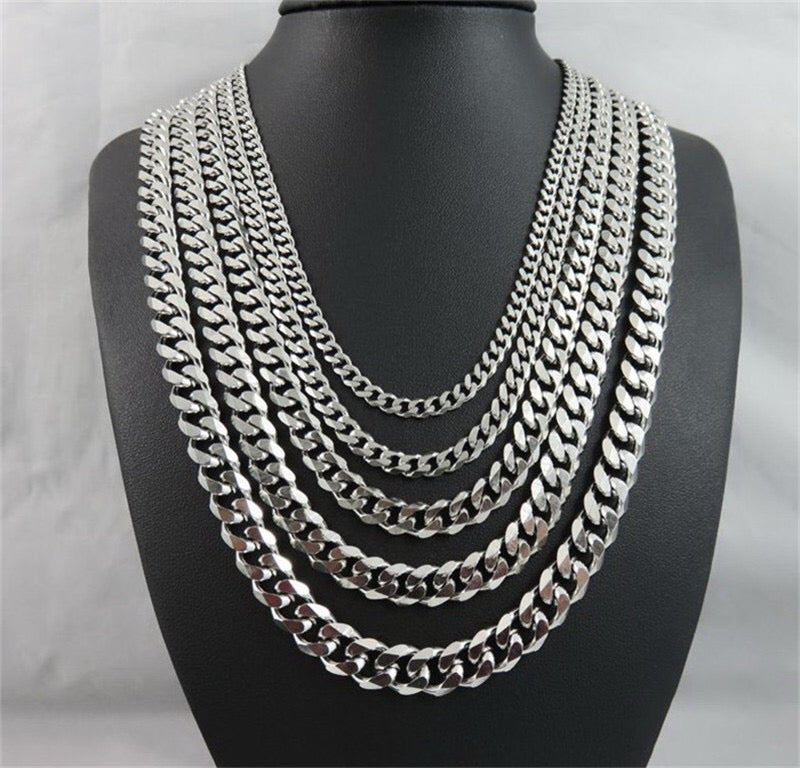 A stylish Miami Cuban chain necklace made of titanium steel, showcasing its shiny finish and available in various widths.