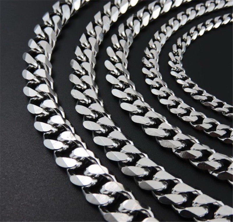 A stylish Miami Cuban chain necklace made of titanium steel, showcasing its shiny finish and available in various widths.