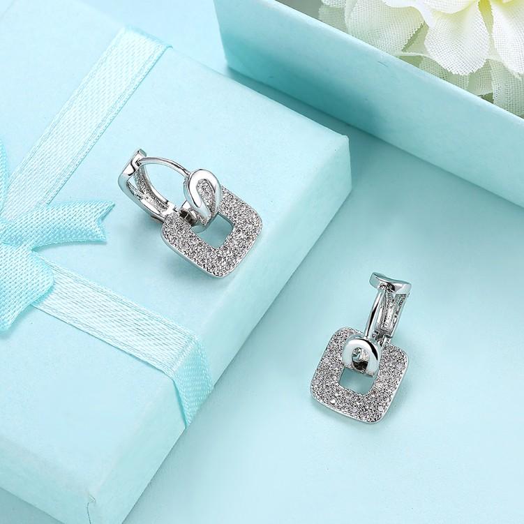 Micro-Pav'e Austrian Crystal Square Shaped Earrings set in 18K White gold plating, showcasing their elegant design and sparkling crystals.