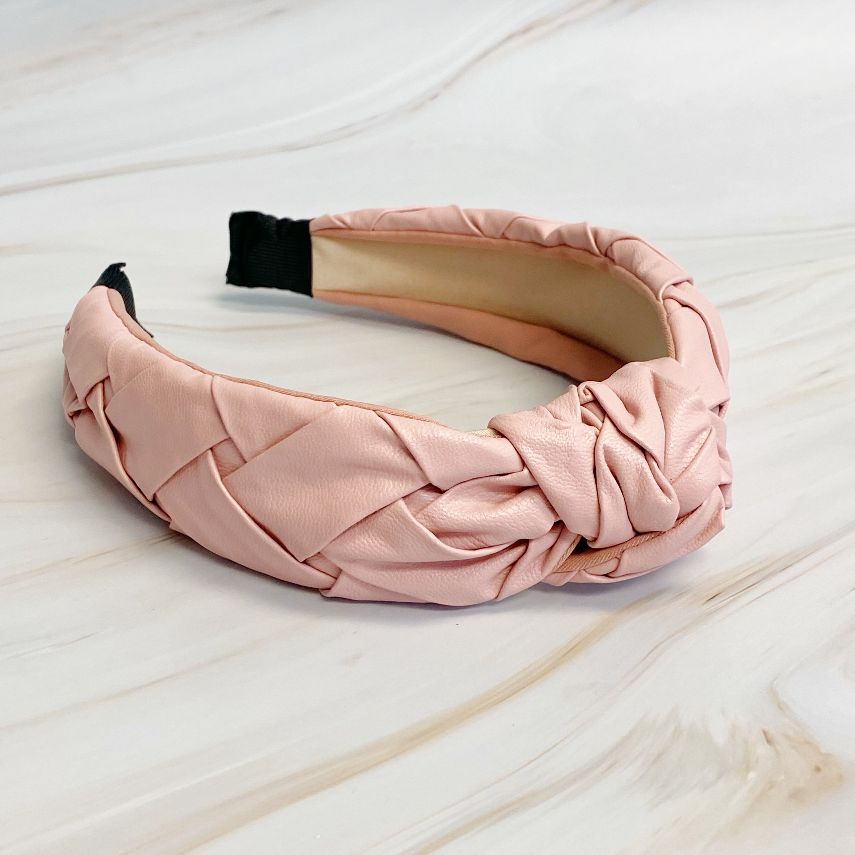 Milano Woven And Knotted Headband featuring a stylish leather woven design and intricate knotted detail.