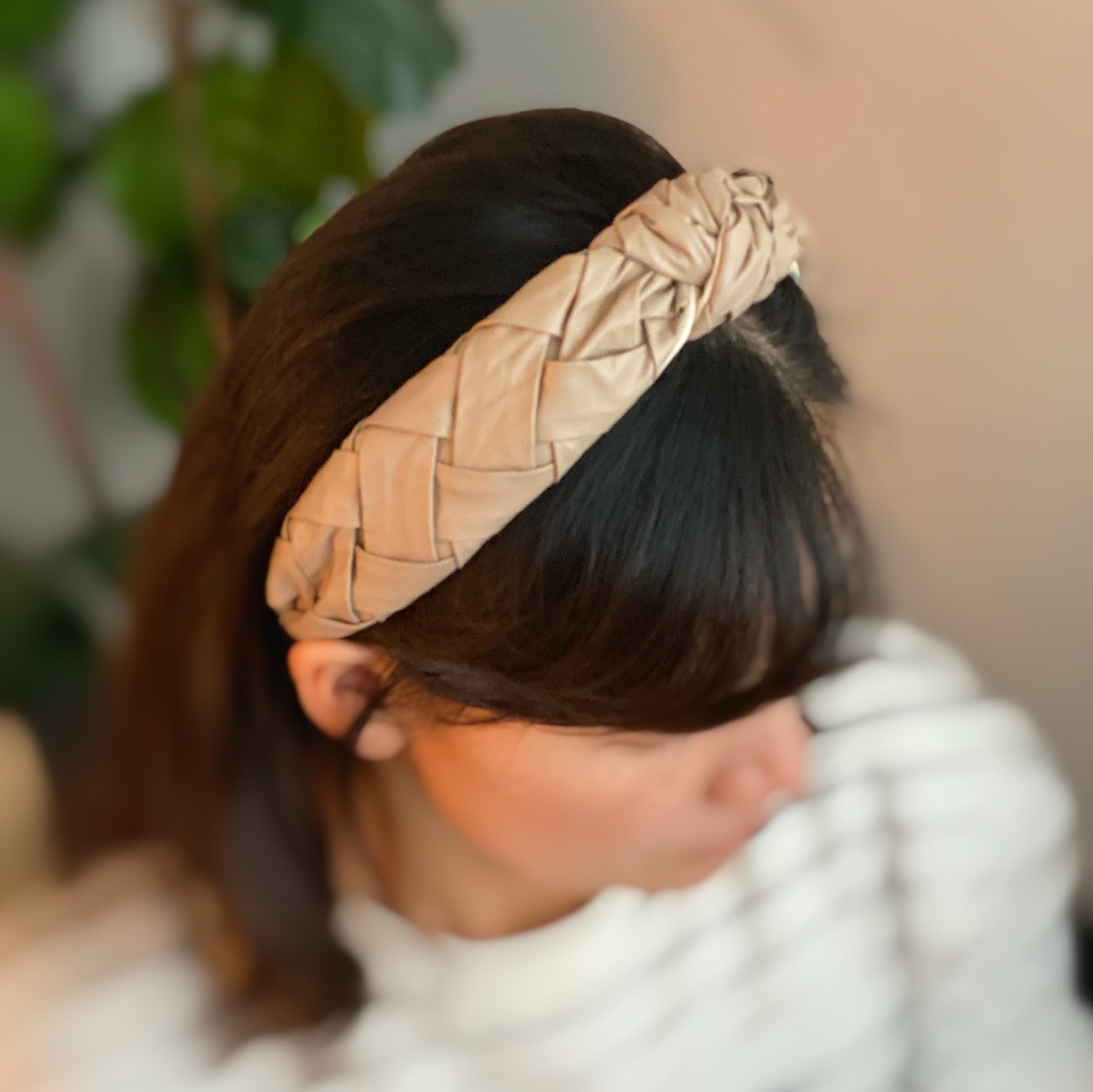 Milano Woven And Knotted Headband featuring a stylish leather woven design and intricate knotted detail.