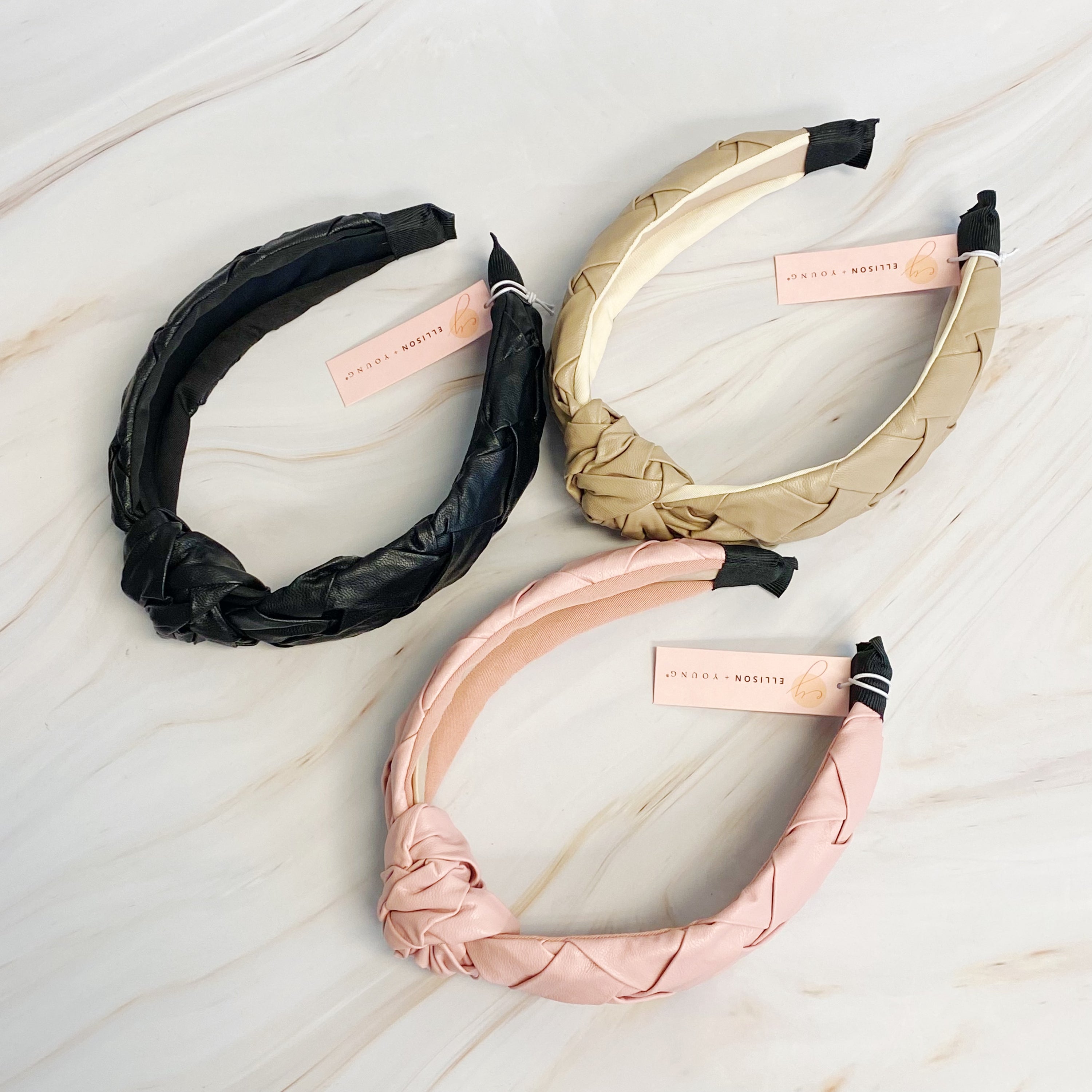 Milano Woven And Knotted Headband featuring a stylish leather woven design and intricate knotted detail.