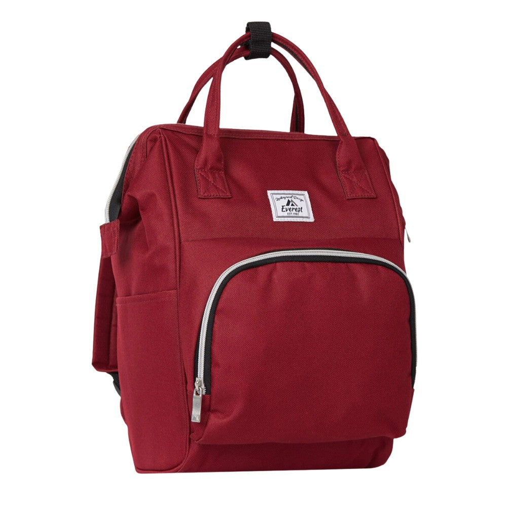 A stylish MINI BACKPACK HANDBAG in two-tone PVC, showcasing its flexible design with grab handles and adjustable straps.