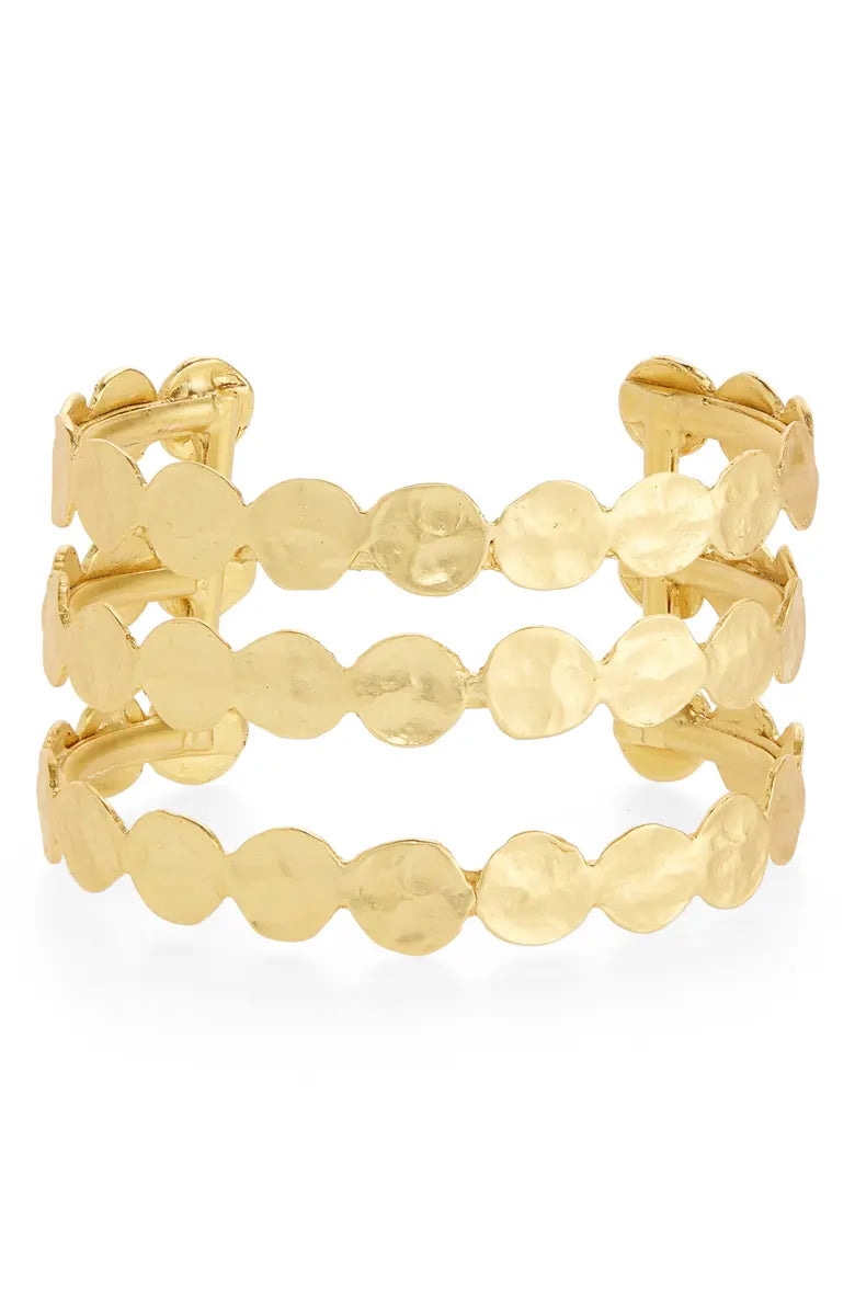 A stylish Mini Coin Cuff Bracelet featuring three rows of coins, available in gold, silver, and rose gold finishes.