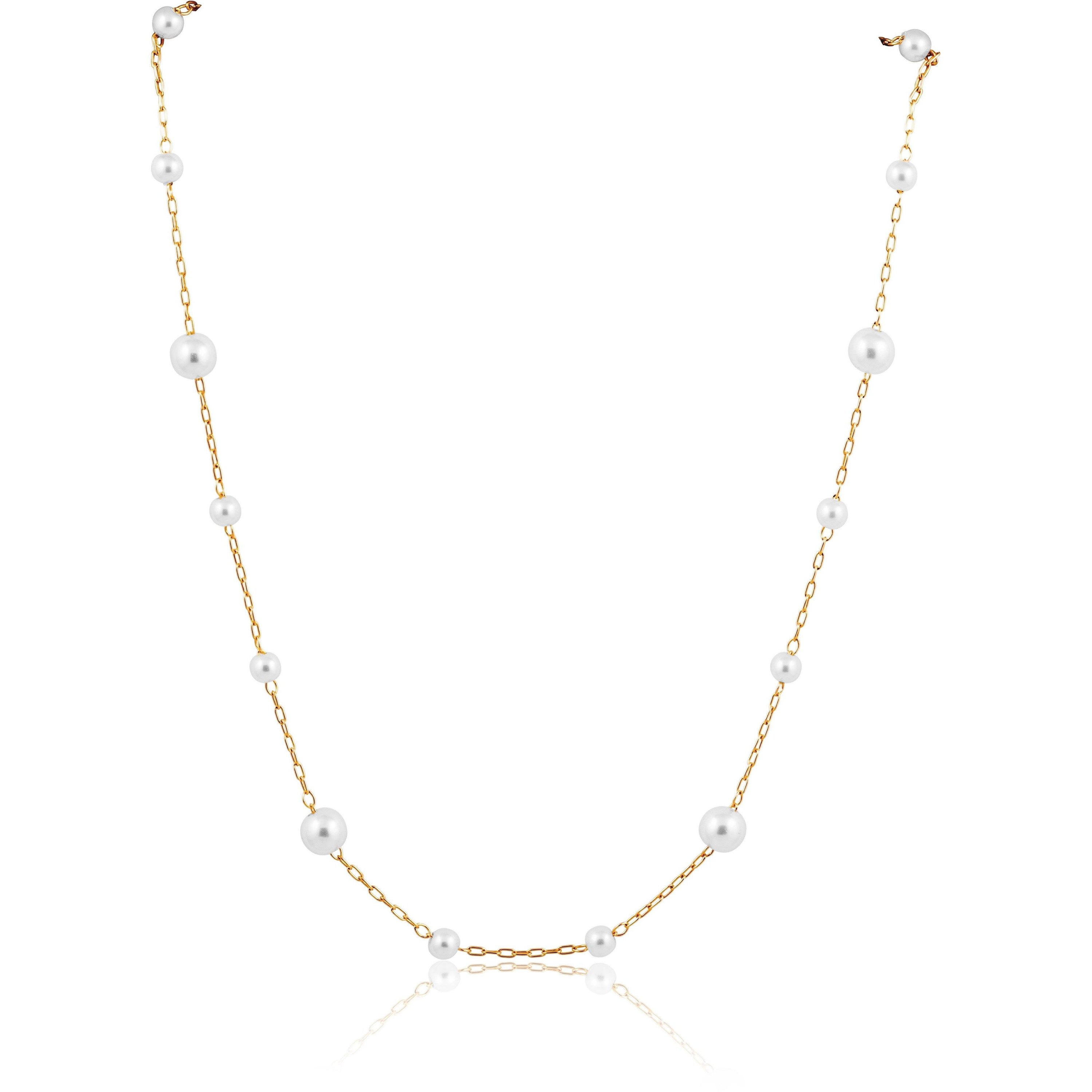 A delicate Mini Pearl Choker featuring freshwater pearls on a thin 14k gold-filled chain, perfect for everyday elegance.