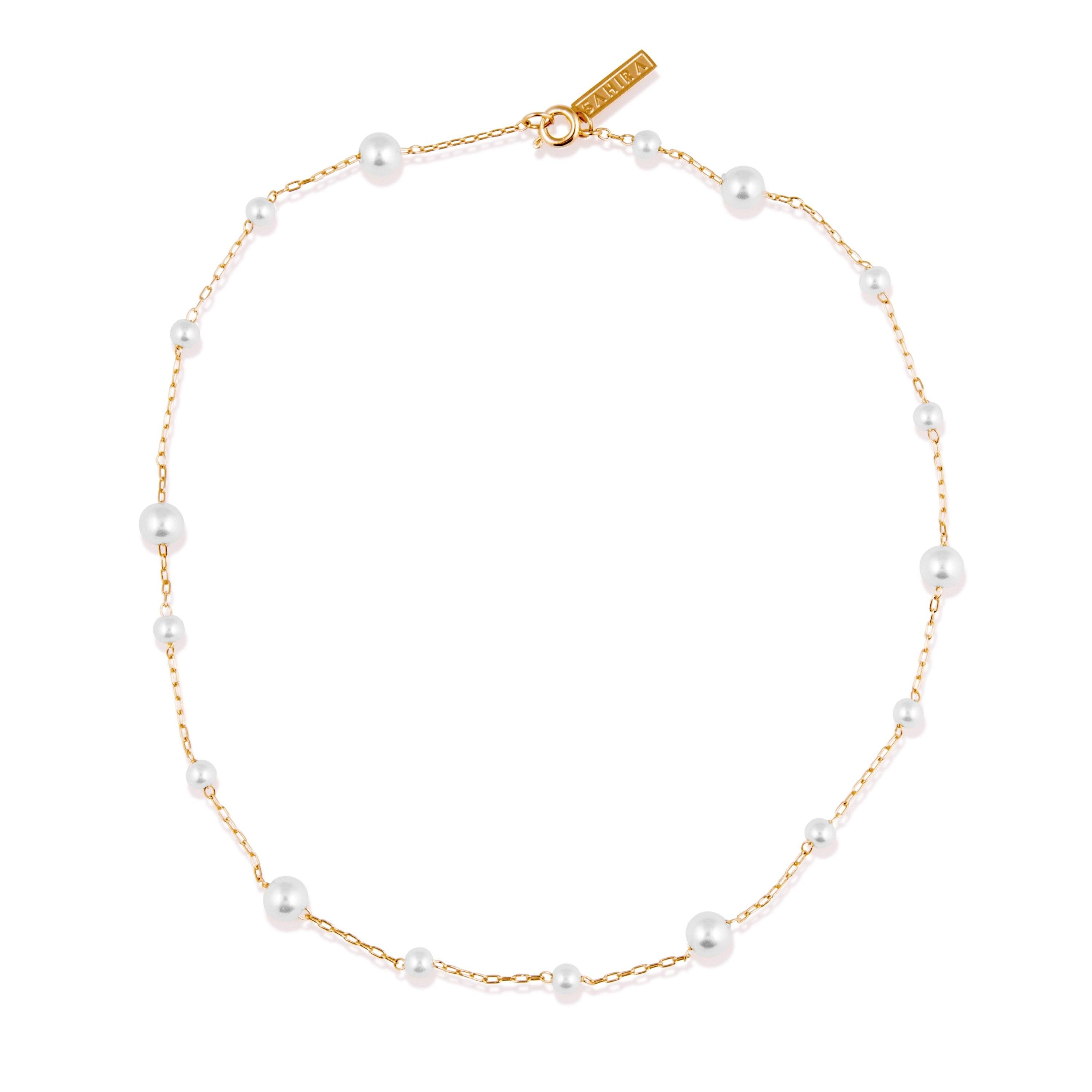 A delicate Mini Pearl Choker featuring freshwater pearls on a thin 14k gold-filled chain, perfect for everyday elegance.